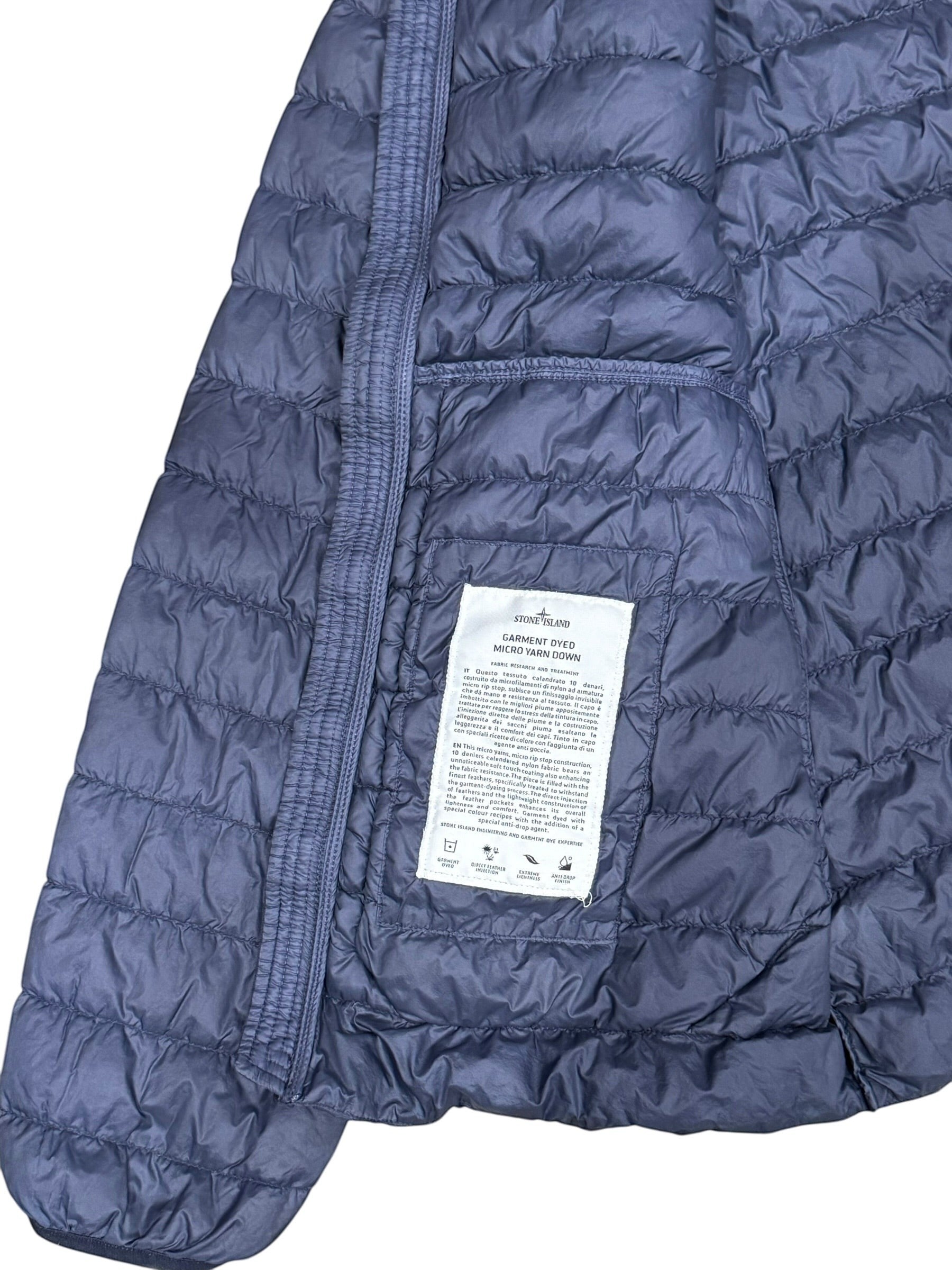 Archive No. 9 Stone Island navy blue down puffer jacket XL, wind and water-resistant with a small repair on the arm.