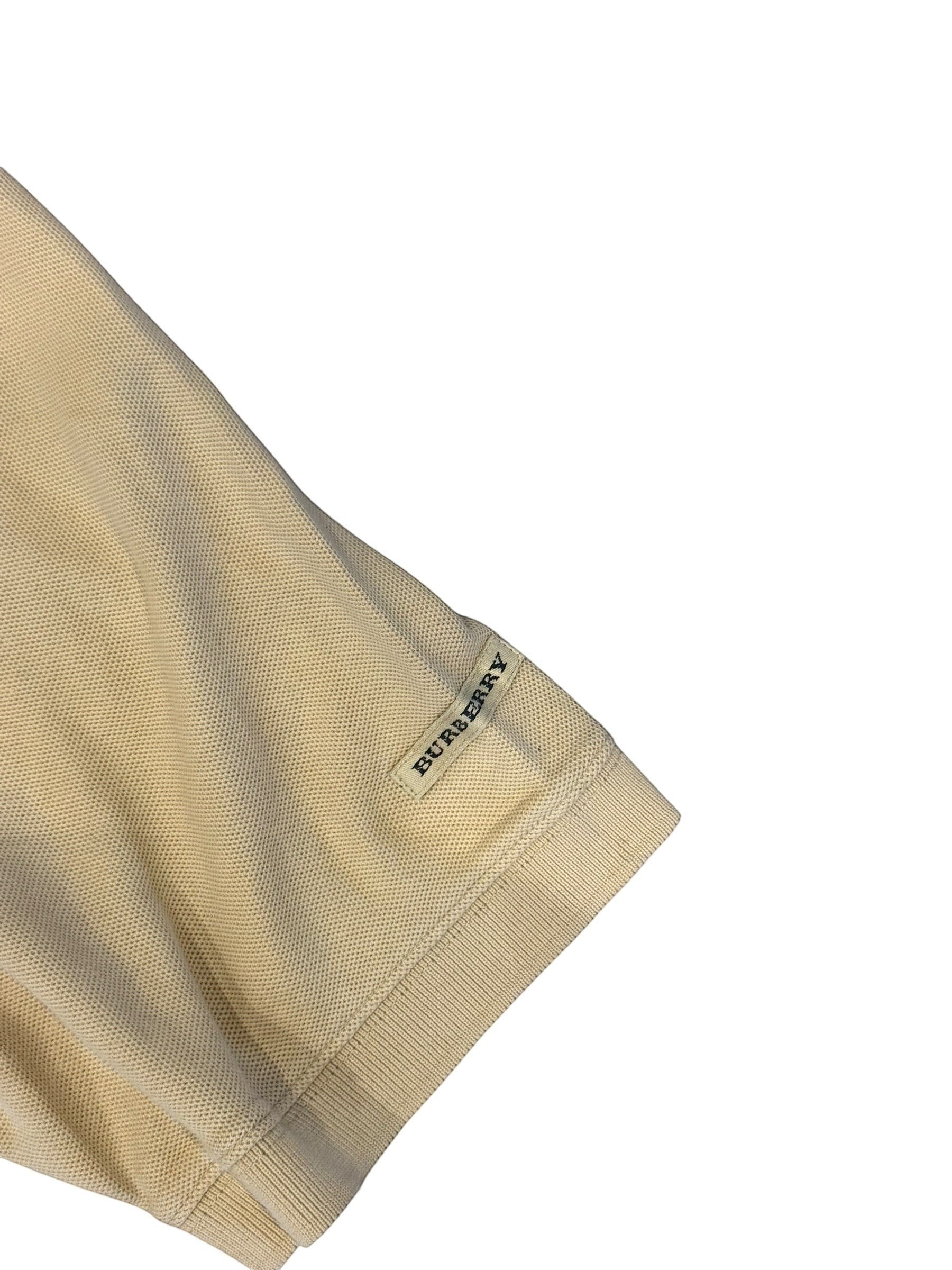 Archive No. 9 beige 100% cotton Burberry polo shirt, size Large, with embroidered logo detail on sleeve.