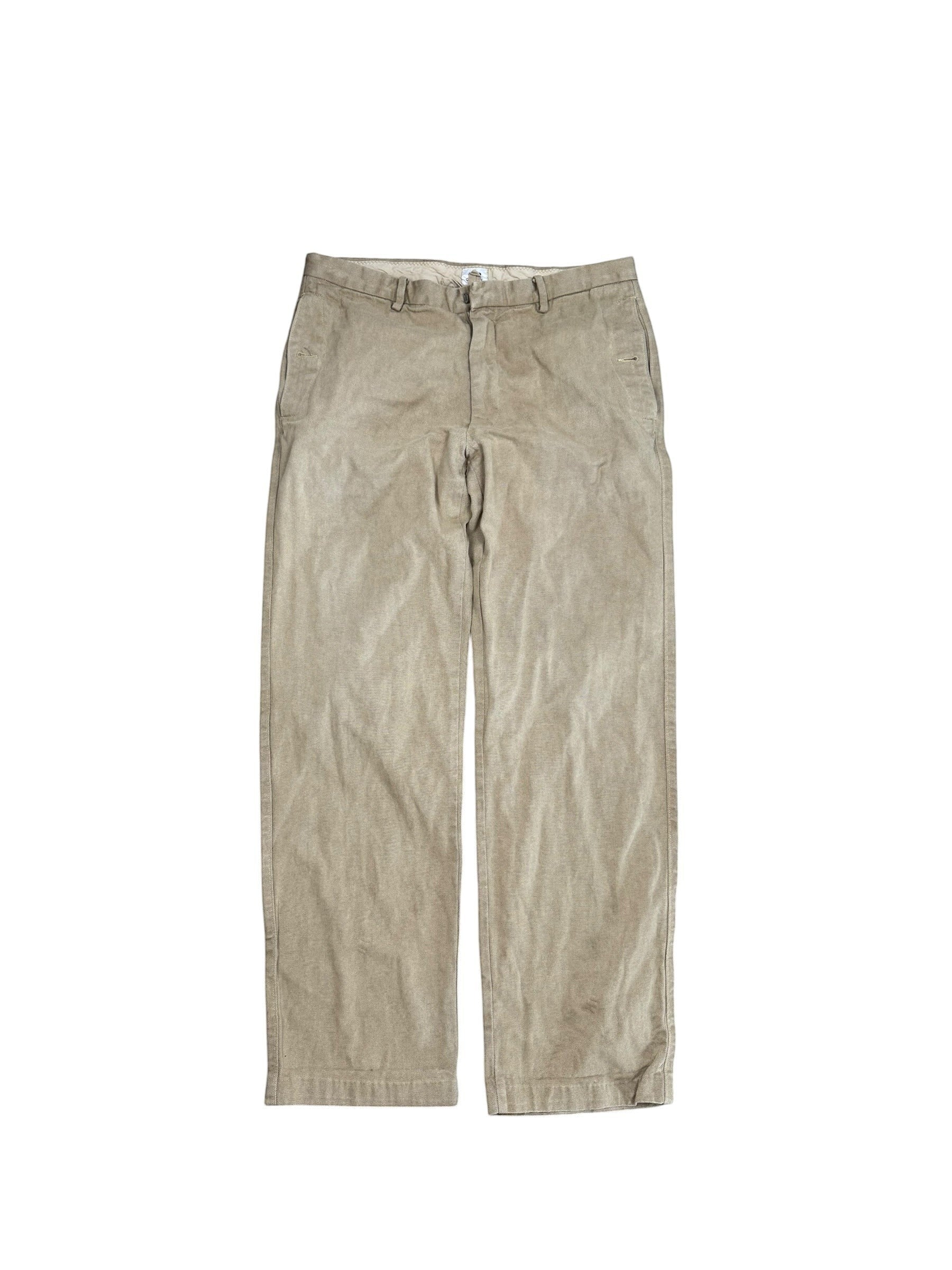 Archive No.9 beige woven denim trousers with a straight leg fit and button-up pockets. Vintage style, size W32.