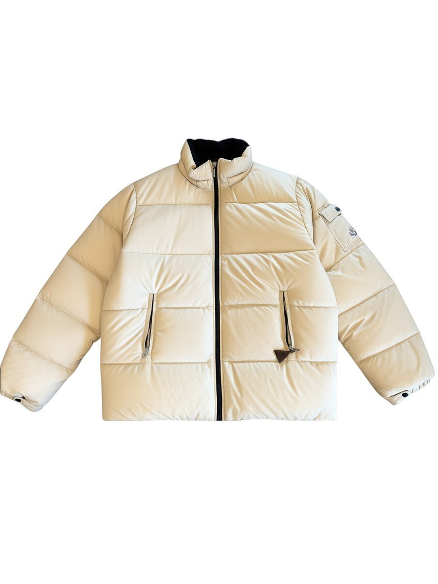 Archive No. 9 vintage beige Moncler down puffer jacket with hidden hood and original tag. Size Large.