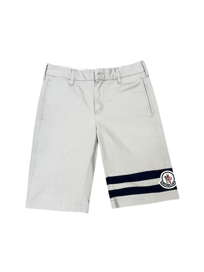 Archive No. 9 beige 100% cotton Moncler shorts with navy stripes and iconic Moncler badge on the leg. Size XS.