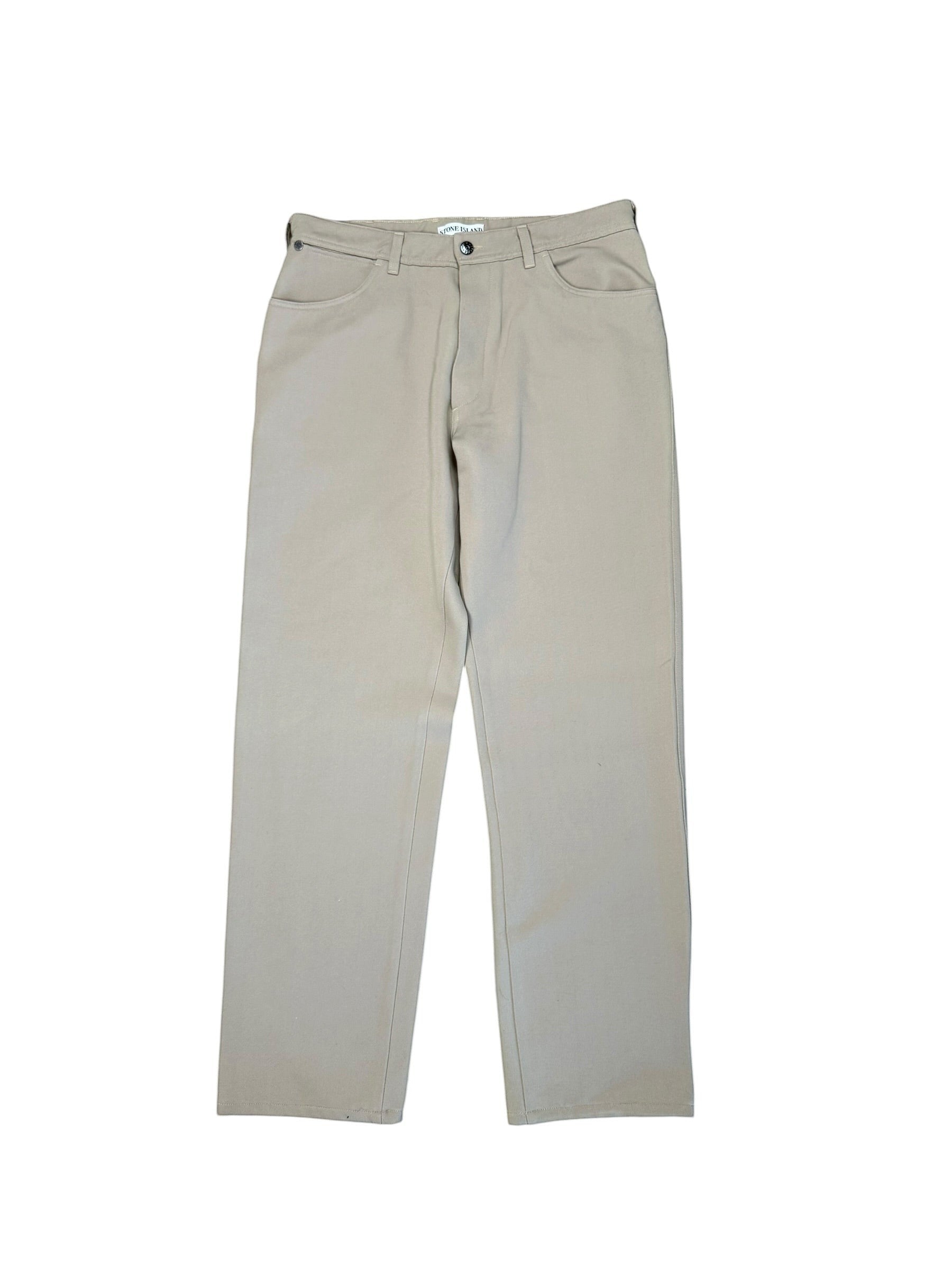 Archive No. 9 presents vintage beige Stone Island Marina trousers, size W36, with a straight cut fit and leather patch detail.