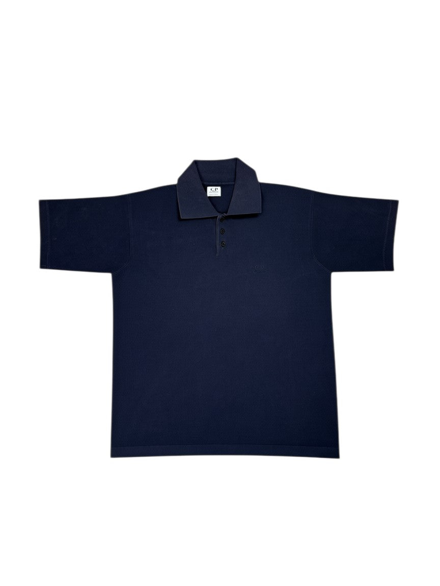 Archive No. 9 vintage black C.P. Company polo shirt with chest spell-out and button neck, size M.