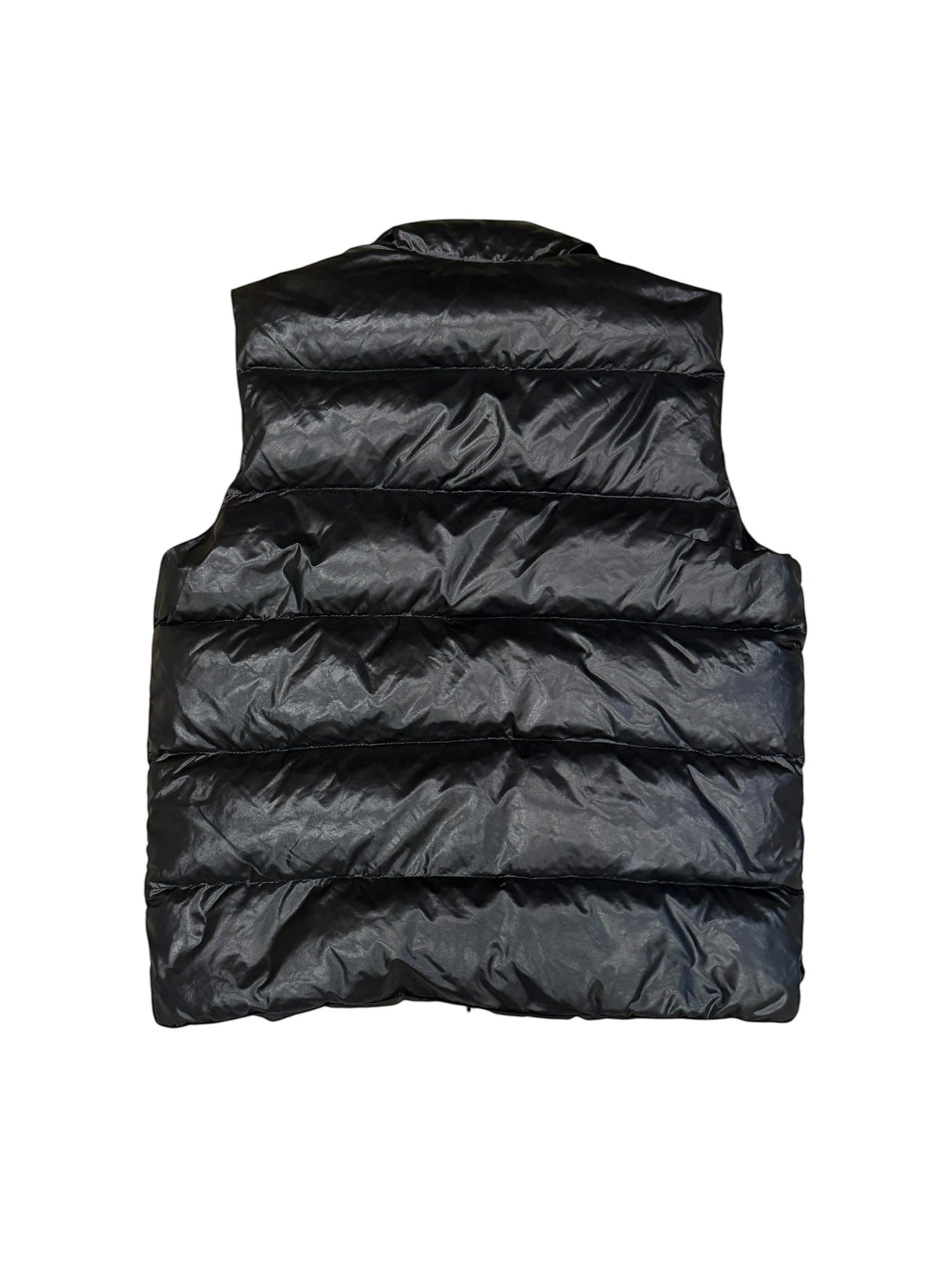 Archive No. 9 black down-filled Moncler body warmer, size Medium, with iconic chest badge.