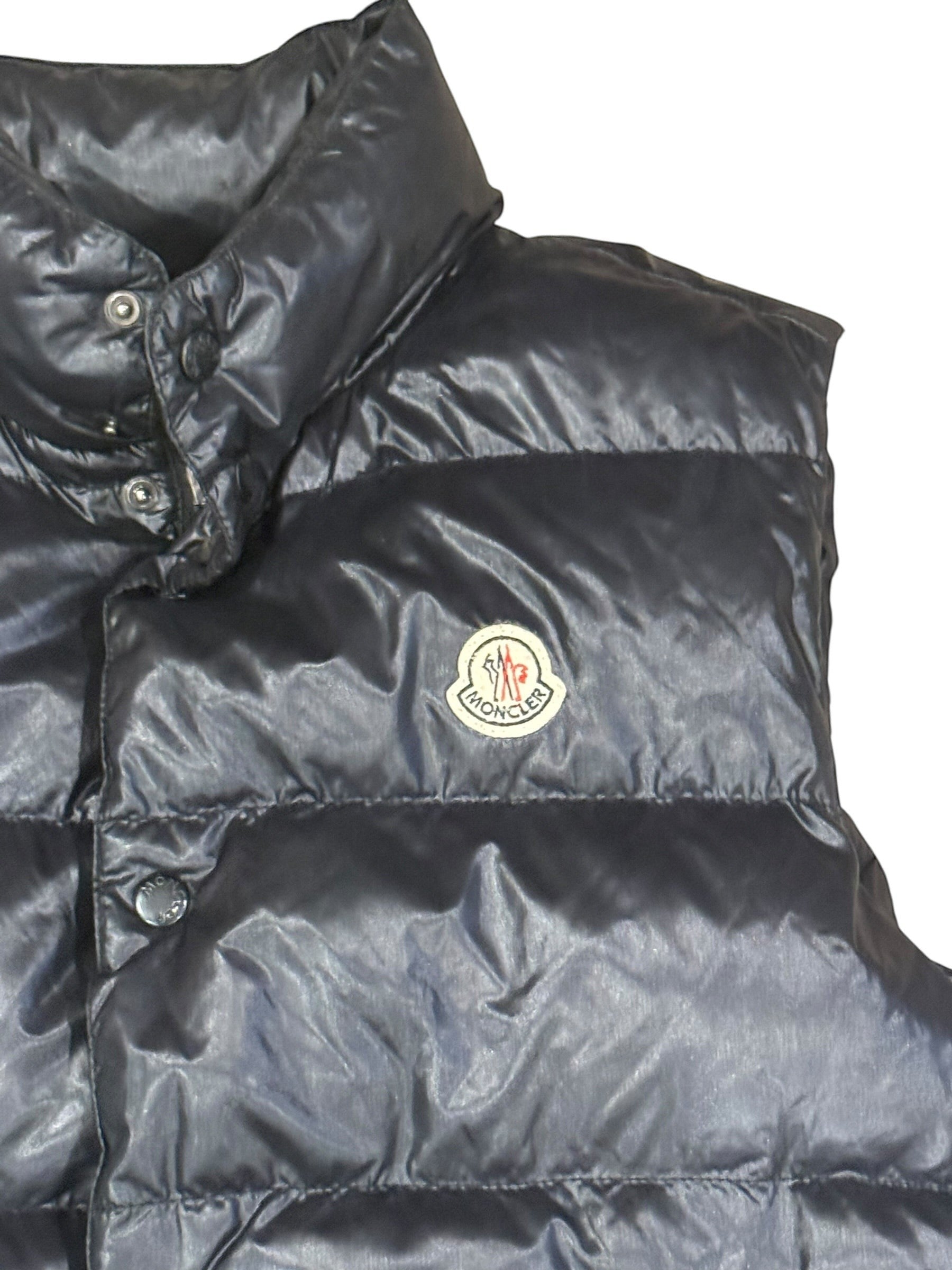Archive No. 9 black down-filled Moncler body warmer with iconic chest badge, size Medium.