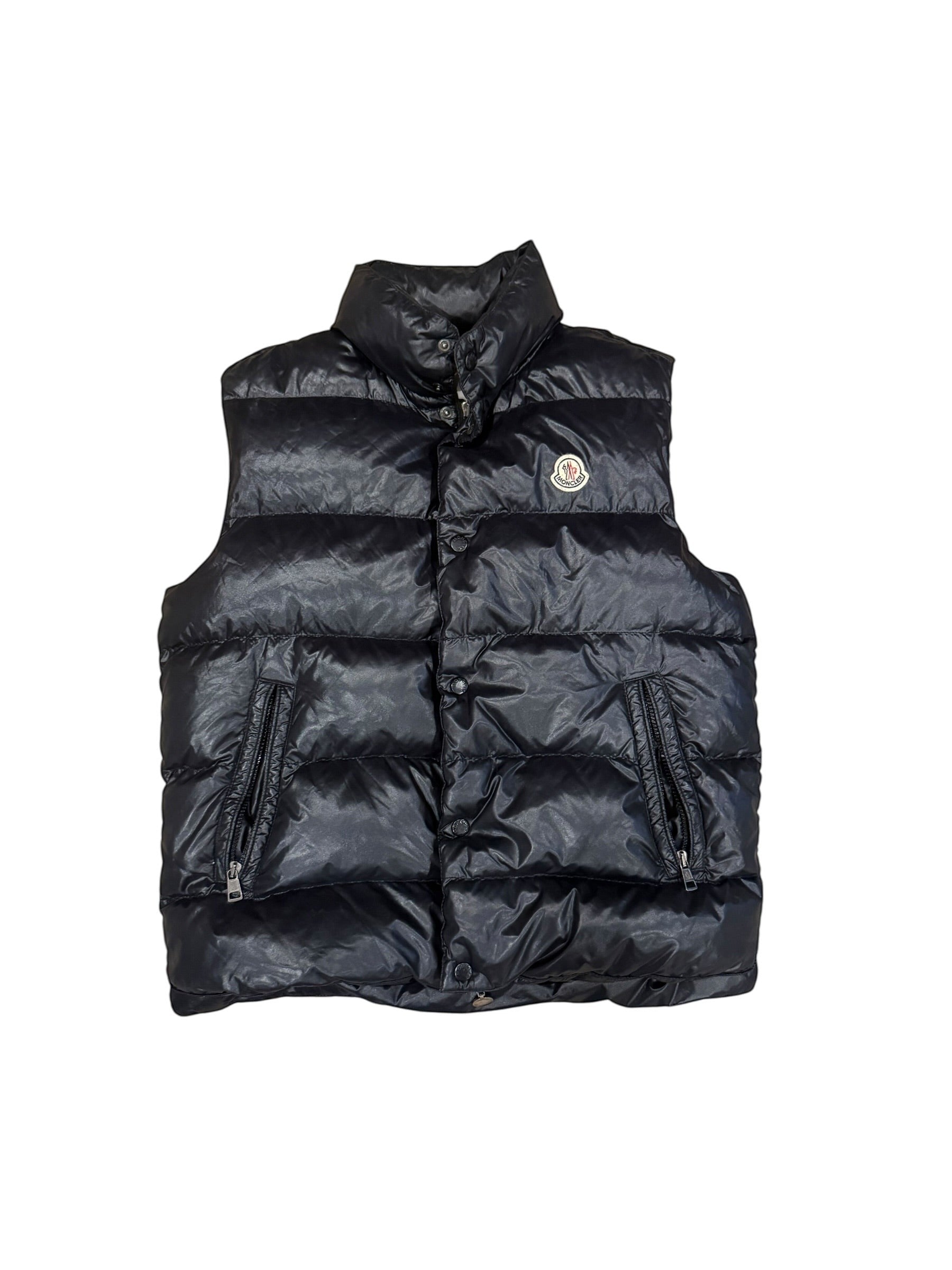 Archive No. 9 black down-filled Moncler body warmer with iconic chest badge, size Medium.