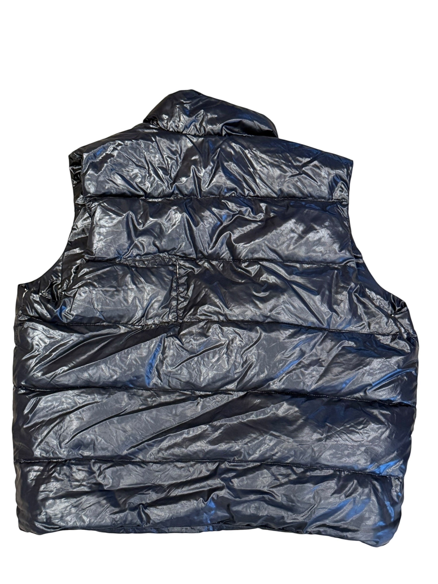 Archive No. 9 black down-filled Moncler gilet, size XL. Sleeveless, quilted design with a high collar.