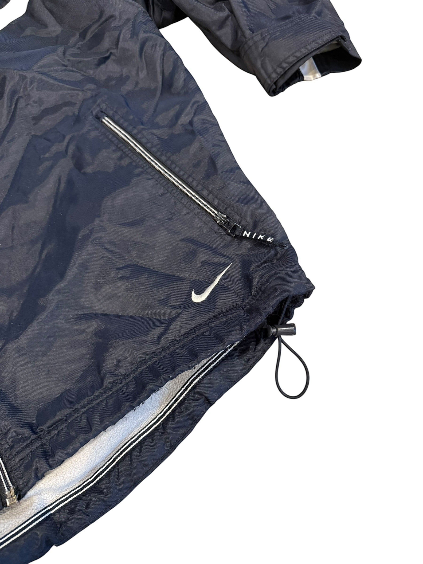 Archive No. 9 vintage black Nike training jacket with water and wind resistance, size L.