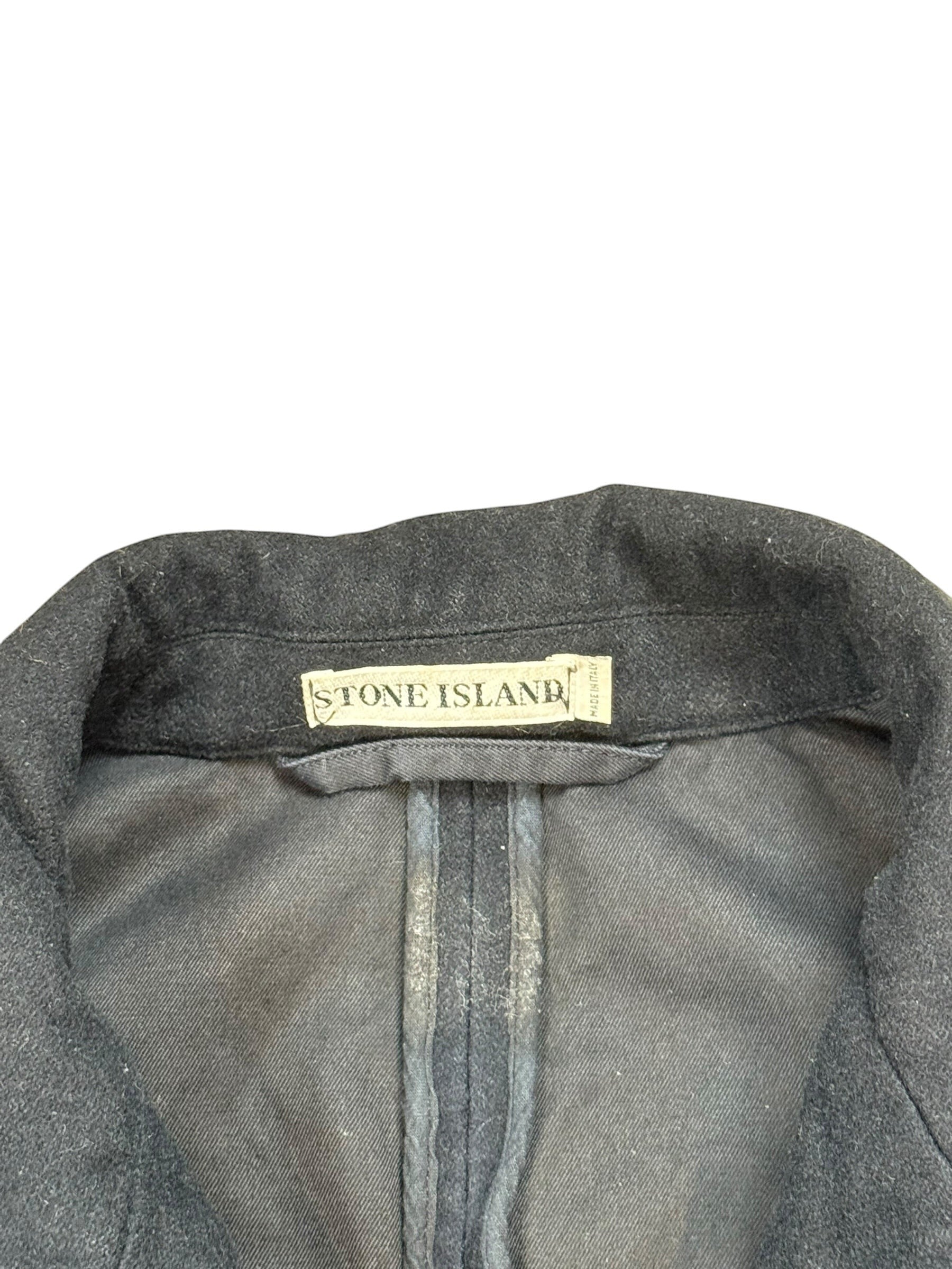 Archive No. 9 vintage black Stone Island duffle coat, size XL, with green edge badge and 1999 reference.