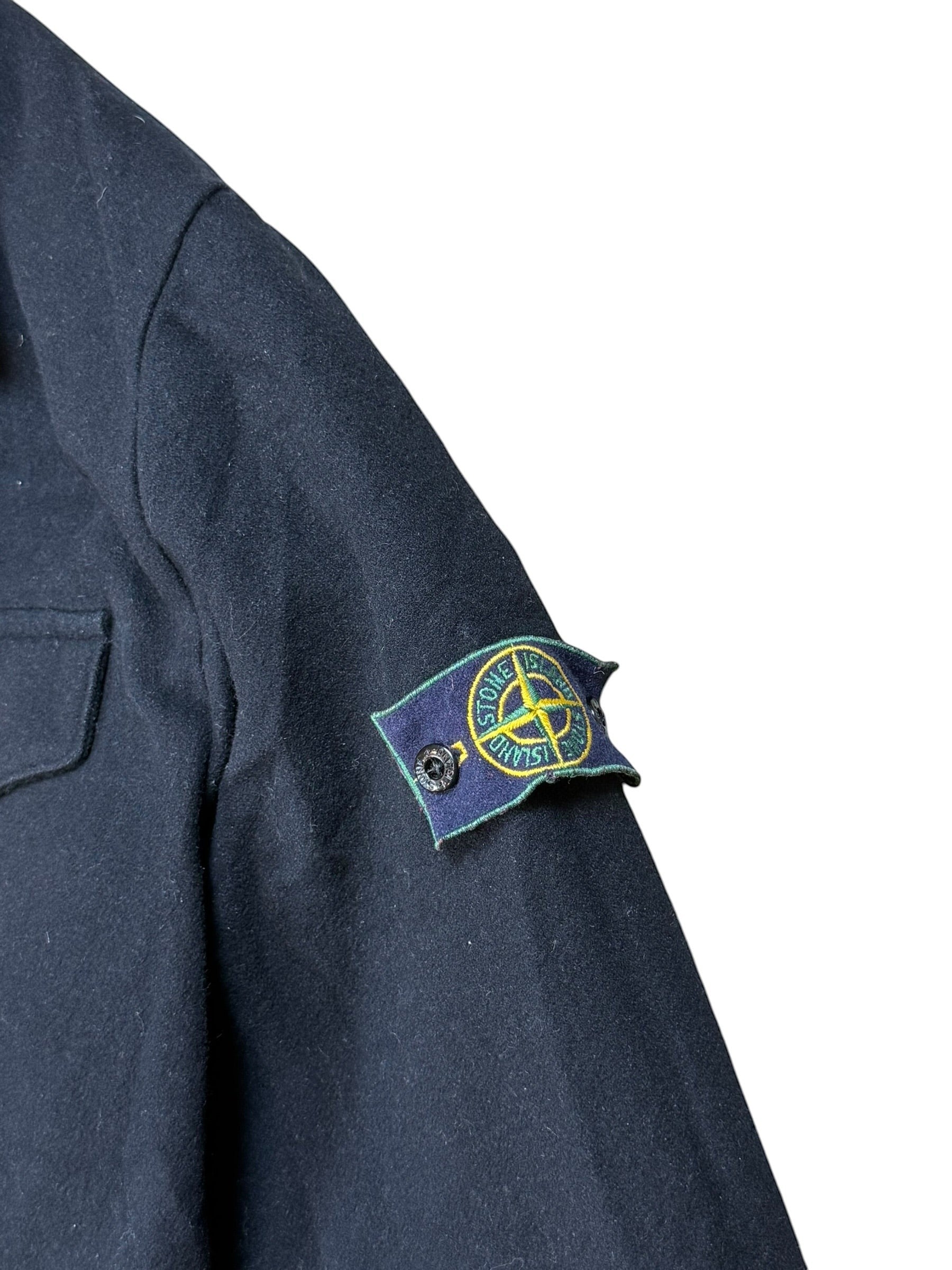 Archive No. 9 black Stone Island duffle coat with green edge badge and 1999 reference, size XL. Missing top button.