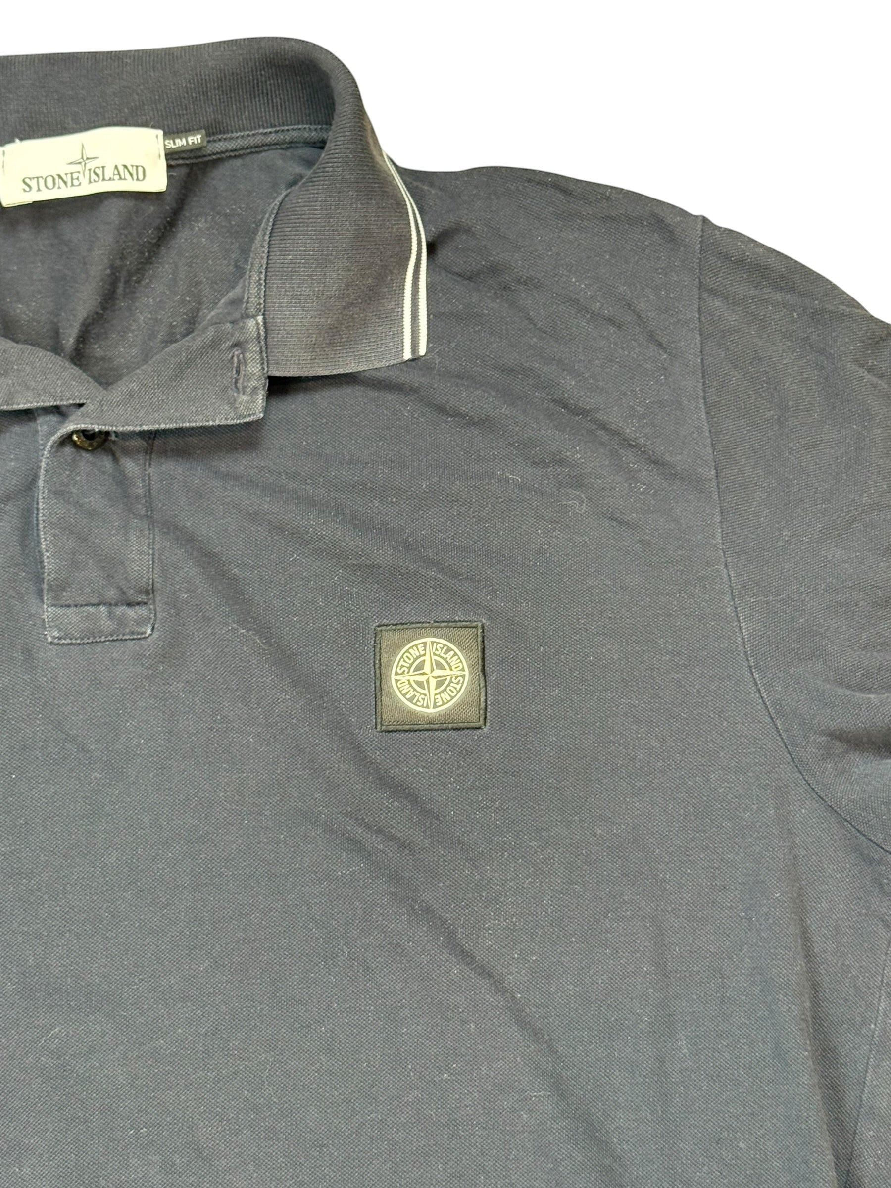 Archive No. 9 black 100% cotton Stone Island polo shirt with compass logo on chest and slim fit.