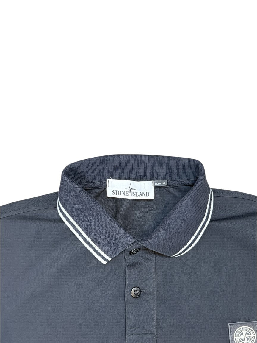 Archive No. 9 black cotton Stone Island polo shirt with iconic chest logo and striped collar, size XL.