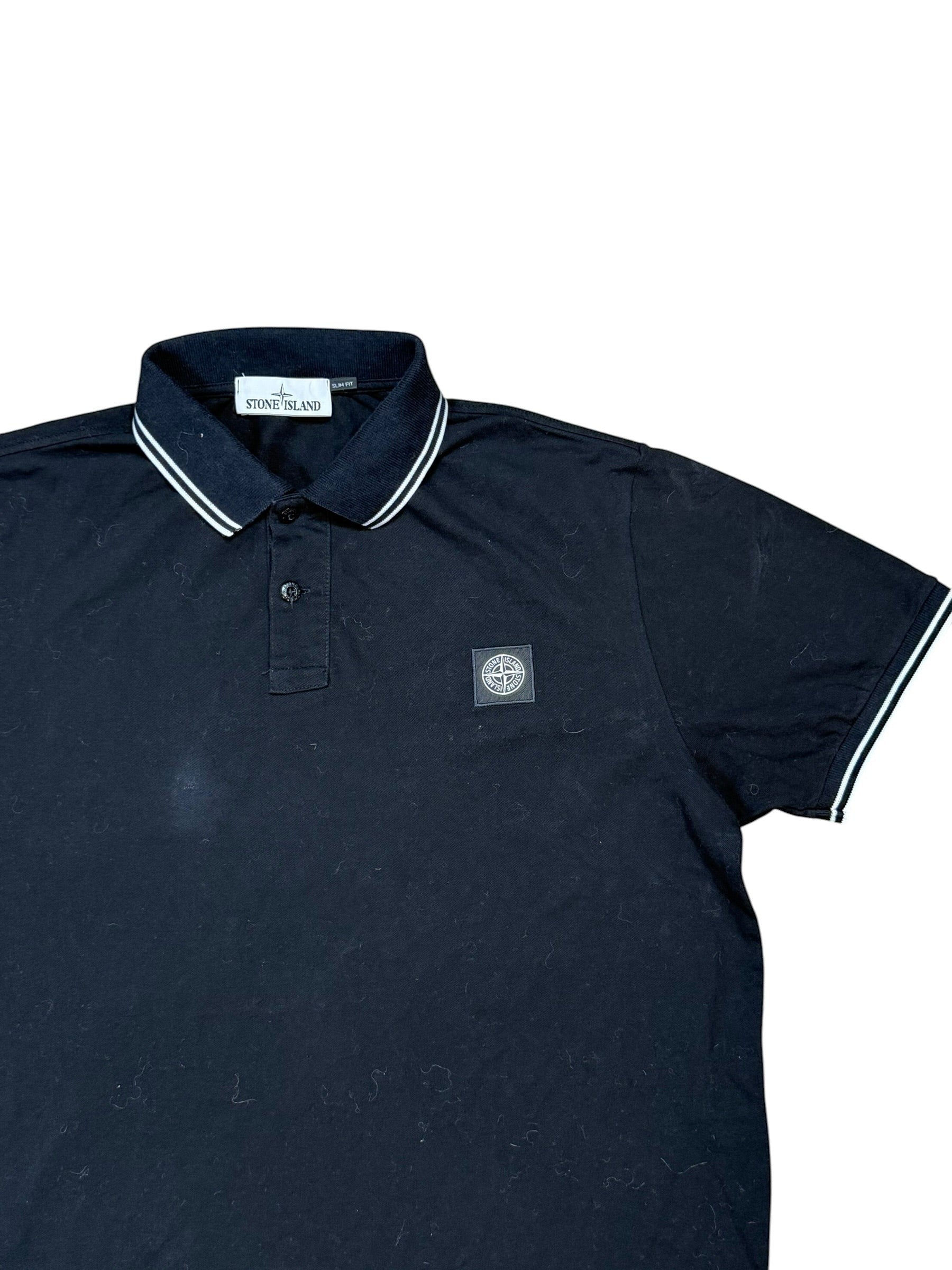 Archive No. 9 black 95% cotton Stone Island polo shirt with white collar trim and chest logo, size XL.