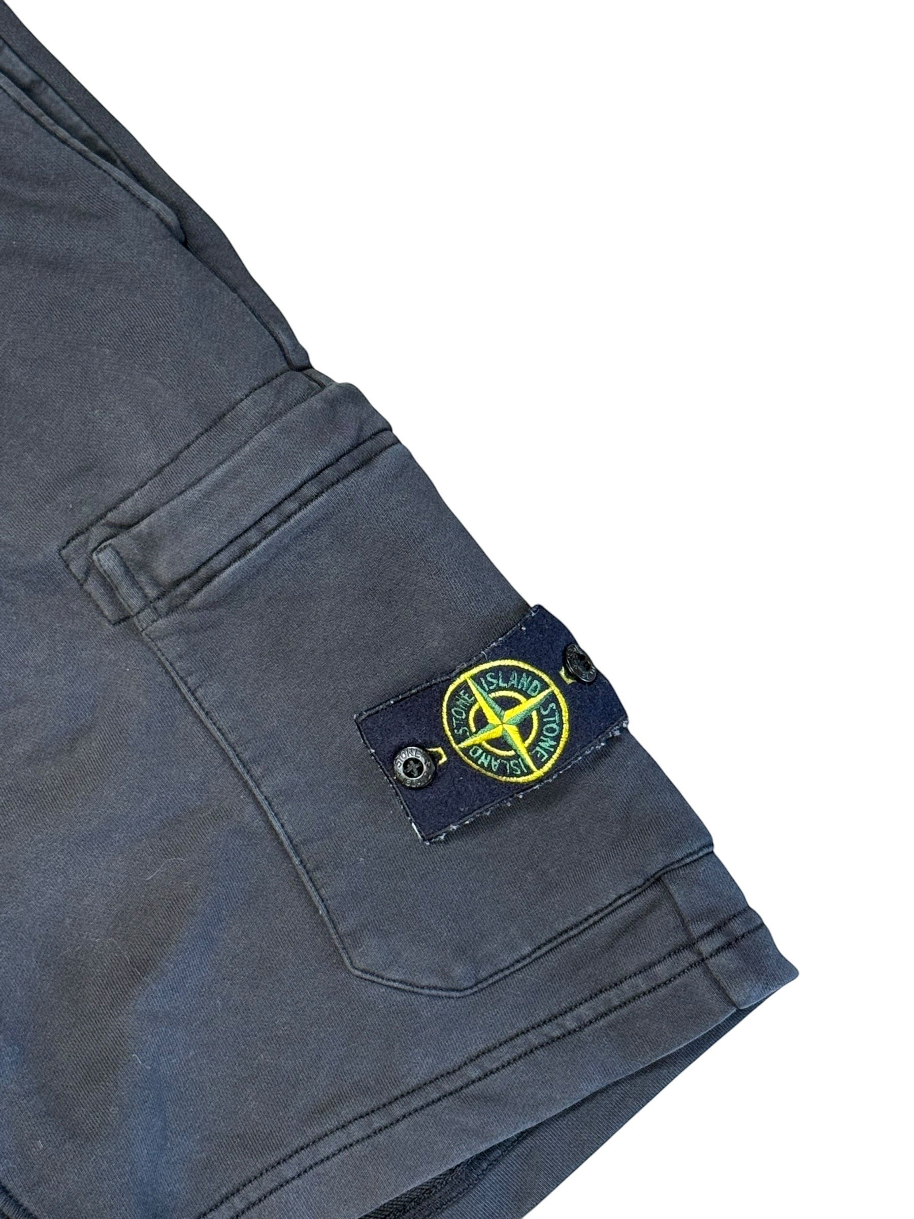 Archive No. 9 vintage black Stone Island shorts, 100% cotton, with iconic compass badge on the lower leg and elasticated waistband. Size L.