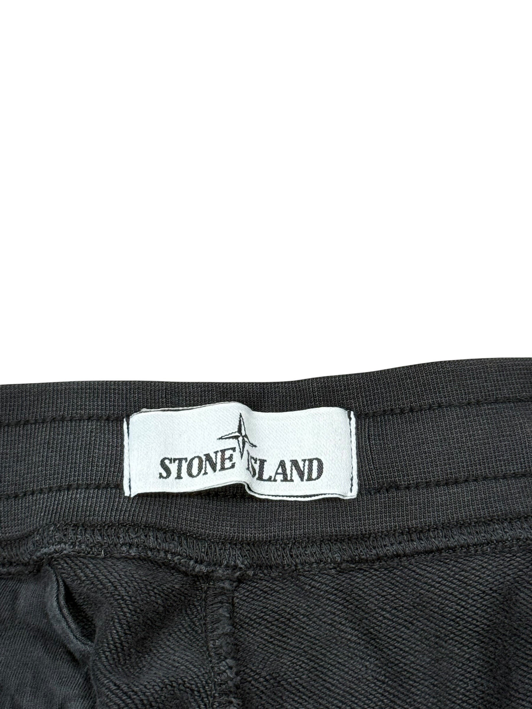 Archive No. 9 black 100% cotton Stone Island shorts with elasticated waistband and compass badge detail.