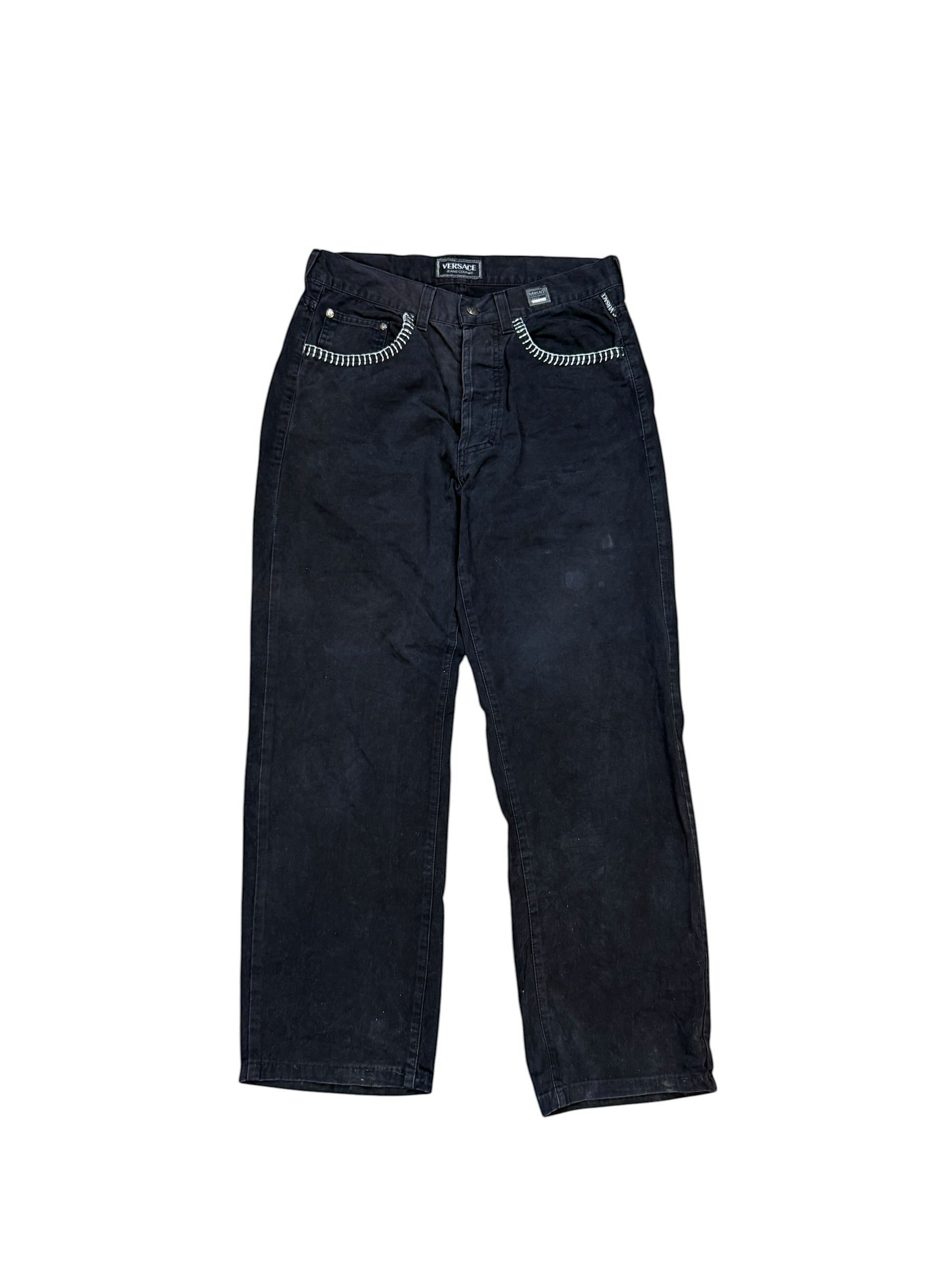 Archive No. 9 vintage black Versace jeans with chunky knit detail on pockets and iconic branding on back. Size W32.
