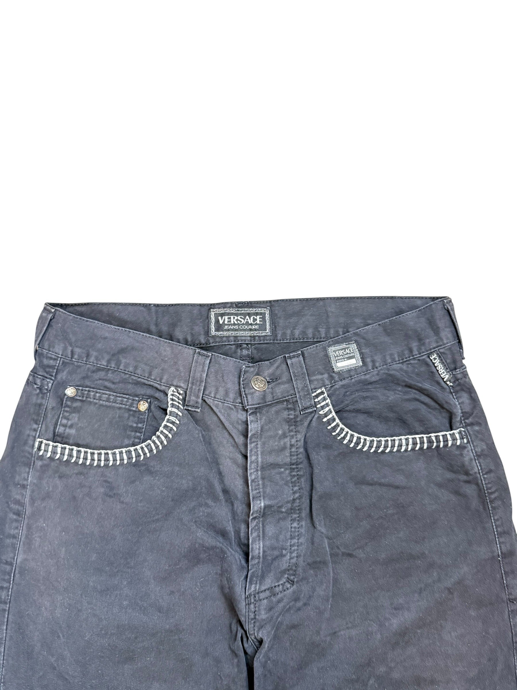 Archive No. 9 vintage black Versace jeans with white contrast stitching on pockets and iconic branding. Size W32.