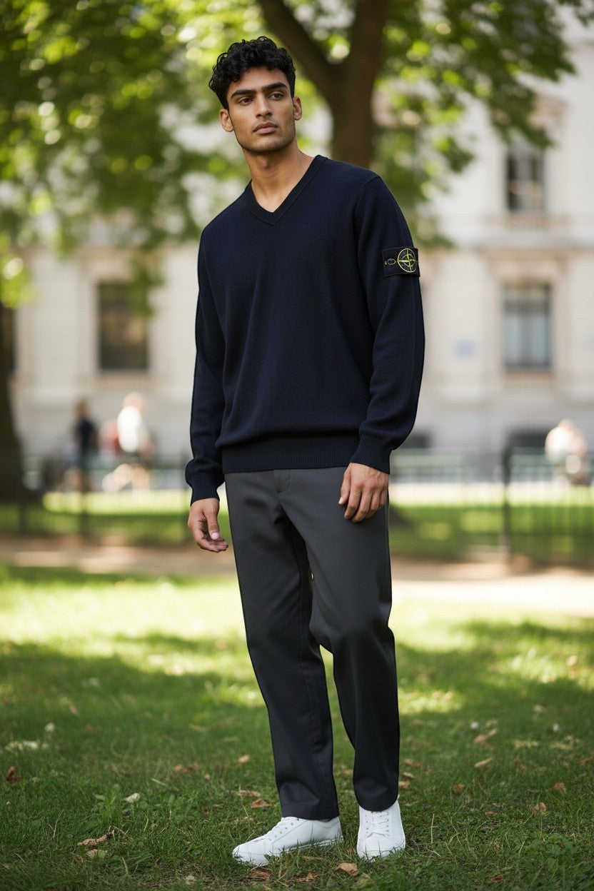 Archive No. 9 black 100% wool V-neck jumper with Stone Island compass badge on the sleeve, size L.