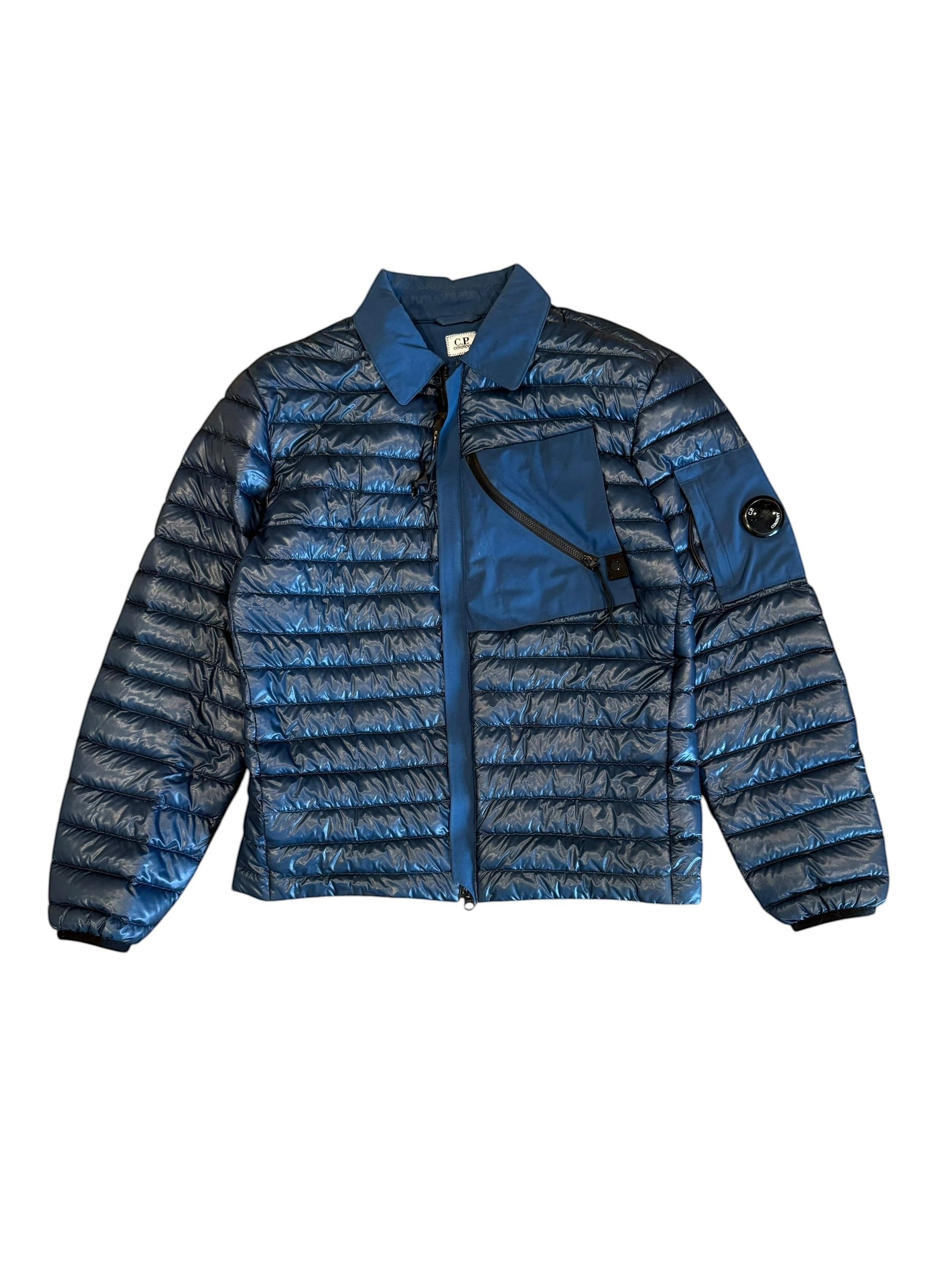 Archive No. 9 C.P. Company blue DD Shell bomber jacket, down-filled with a lightweight design and signature lens detail on the sleeve.