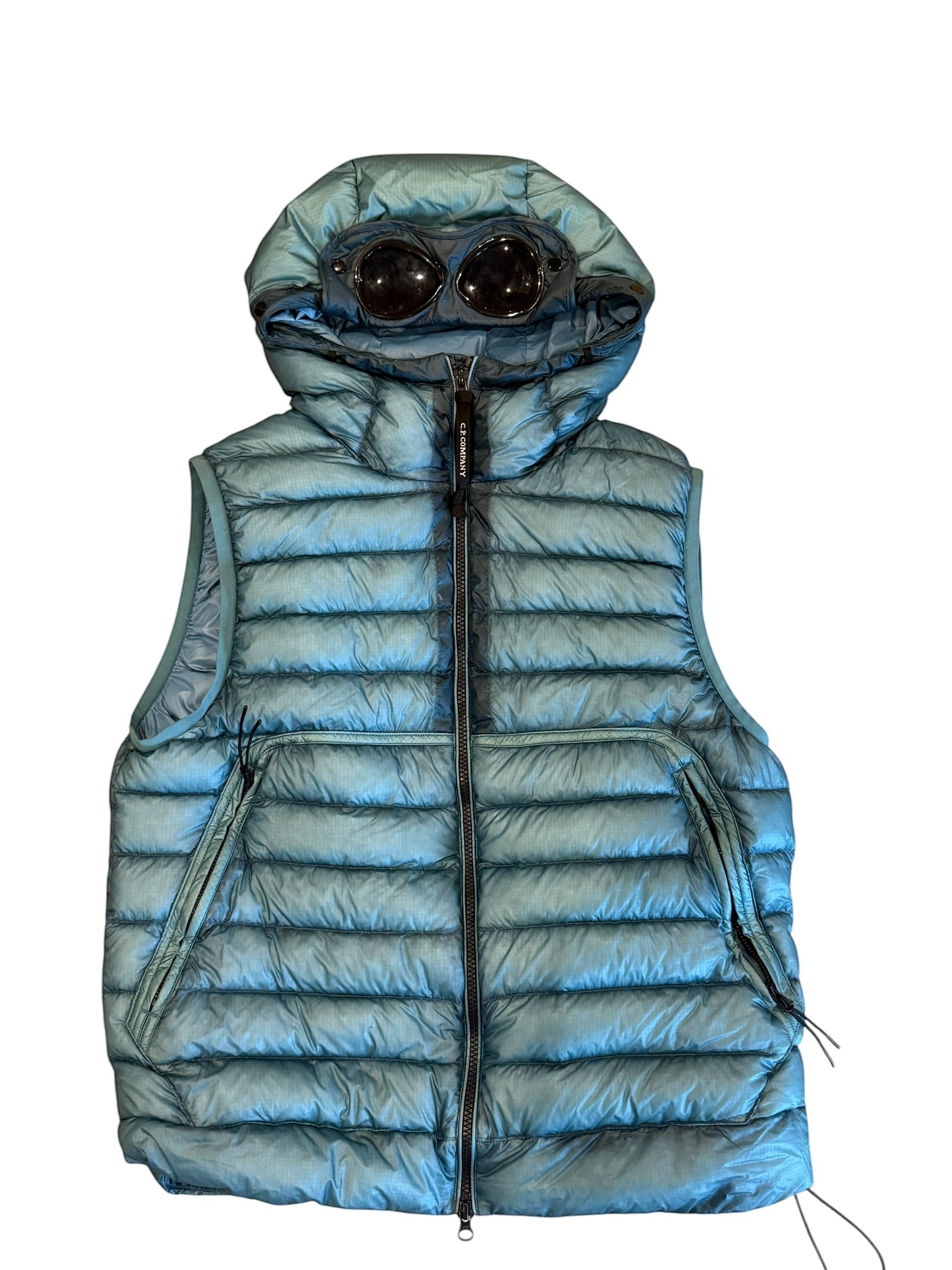 Archive No. 9 blue C.P. Company hooded down-filled DD Shell body warmer with signature goggles.