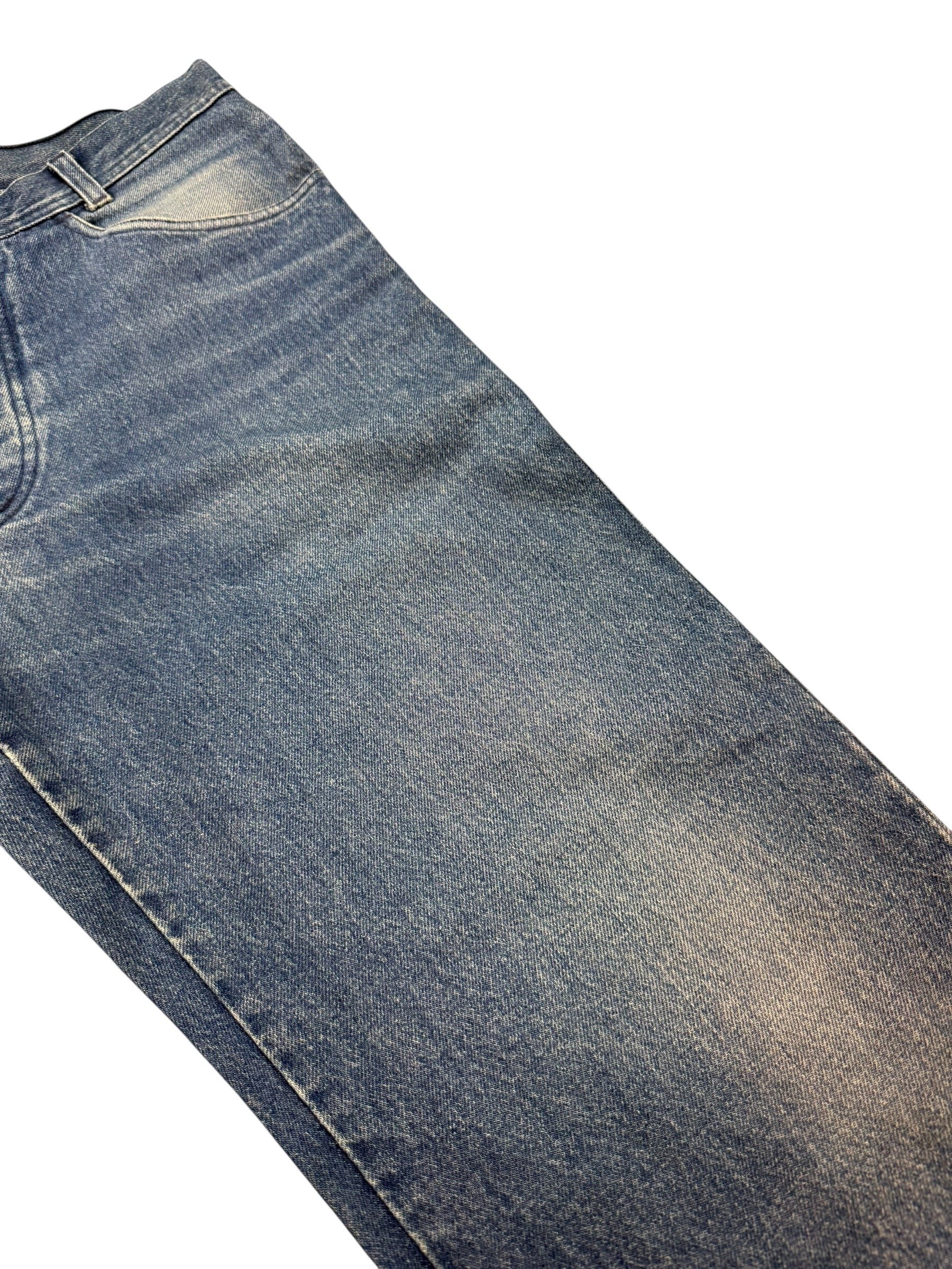 Archive No. 9 vintage blue denim jeans, size W30, with a straight cut fit and the iconic green edge Stone Island badge on the back pocket.