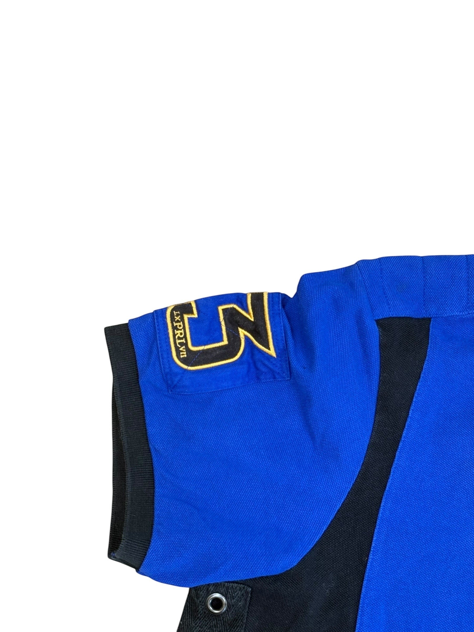Archive No. 9 blue and black short sleeve polo shirt with large embroidered 'N' logo on the chest and 'RLPRLVII' text.