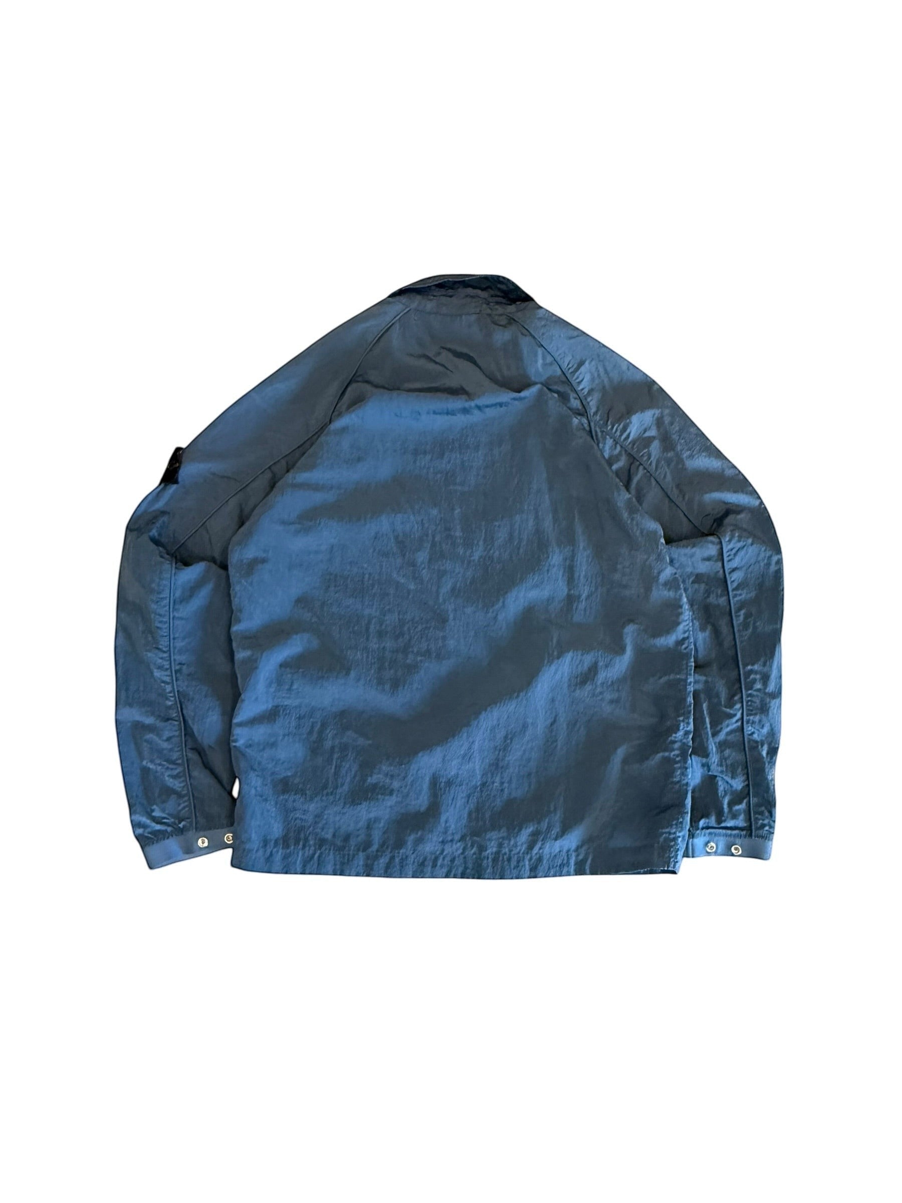 Archive No. 9 blue Stone Island nylon jacket, size L, lightweight and water-resistant with a streamlined fit.