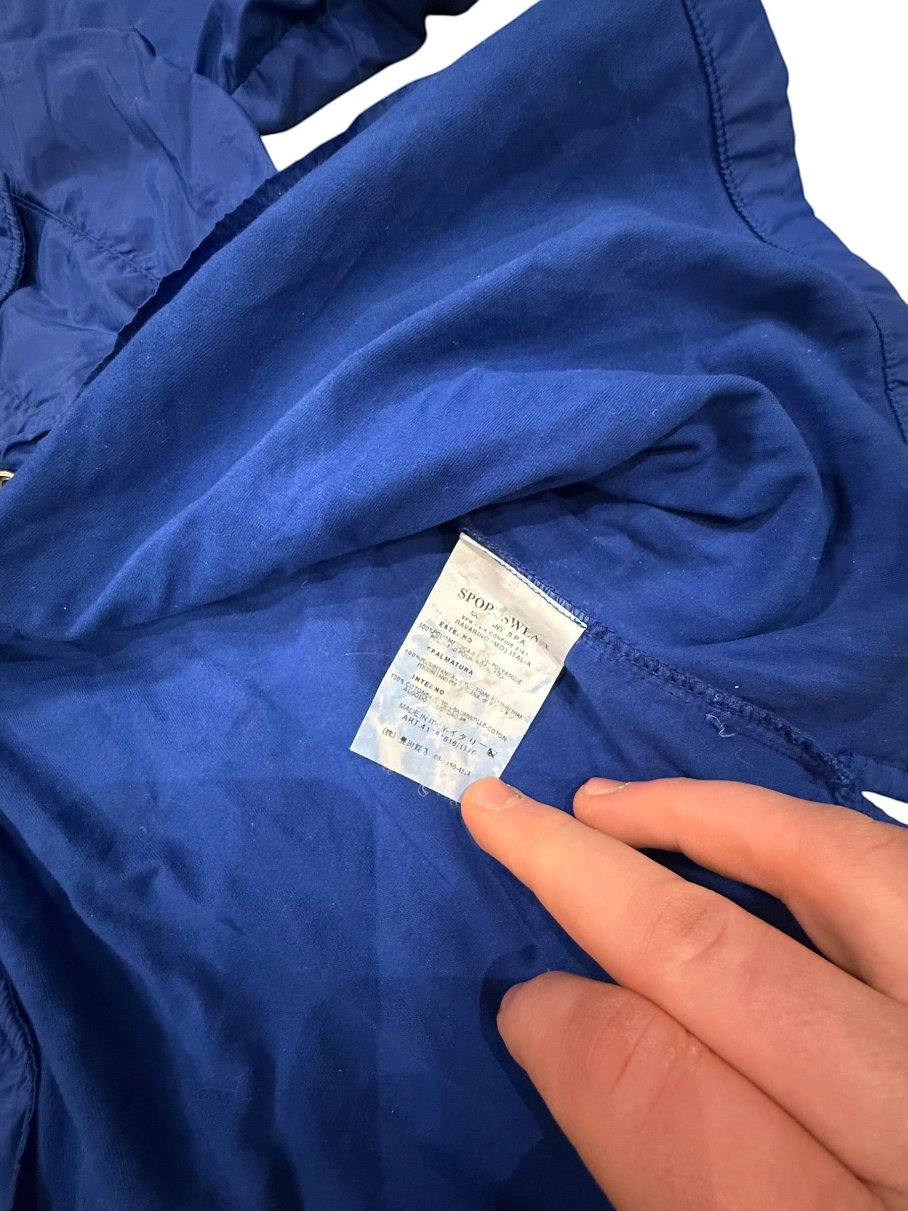 Archive No. 9 blue Stone Island windbreaker jacket, size M. Lightweight, waterproof, and wind-resistant.