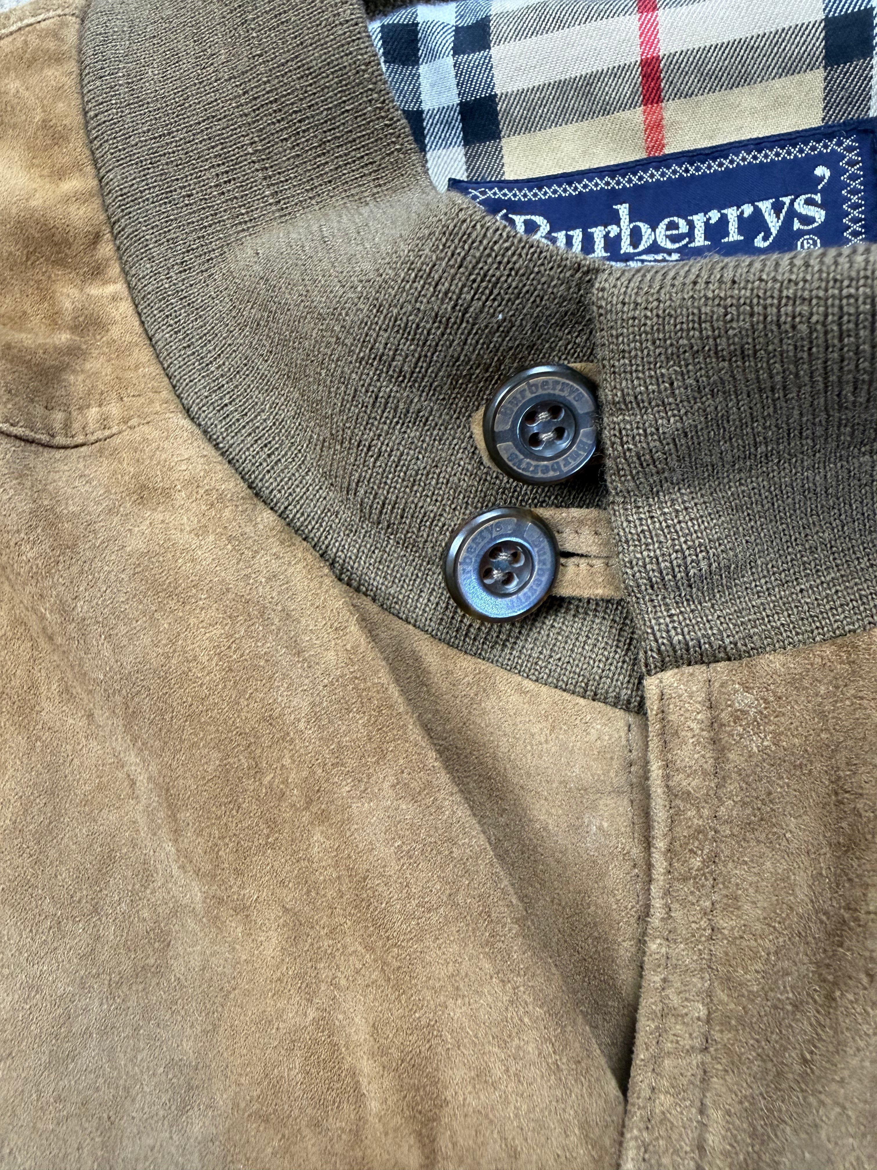 Archive No. 9 Burberry khaki suede bomber jacket with iconic check lining and button details.