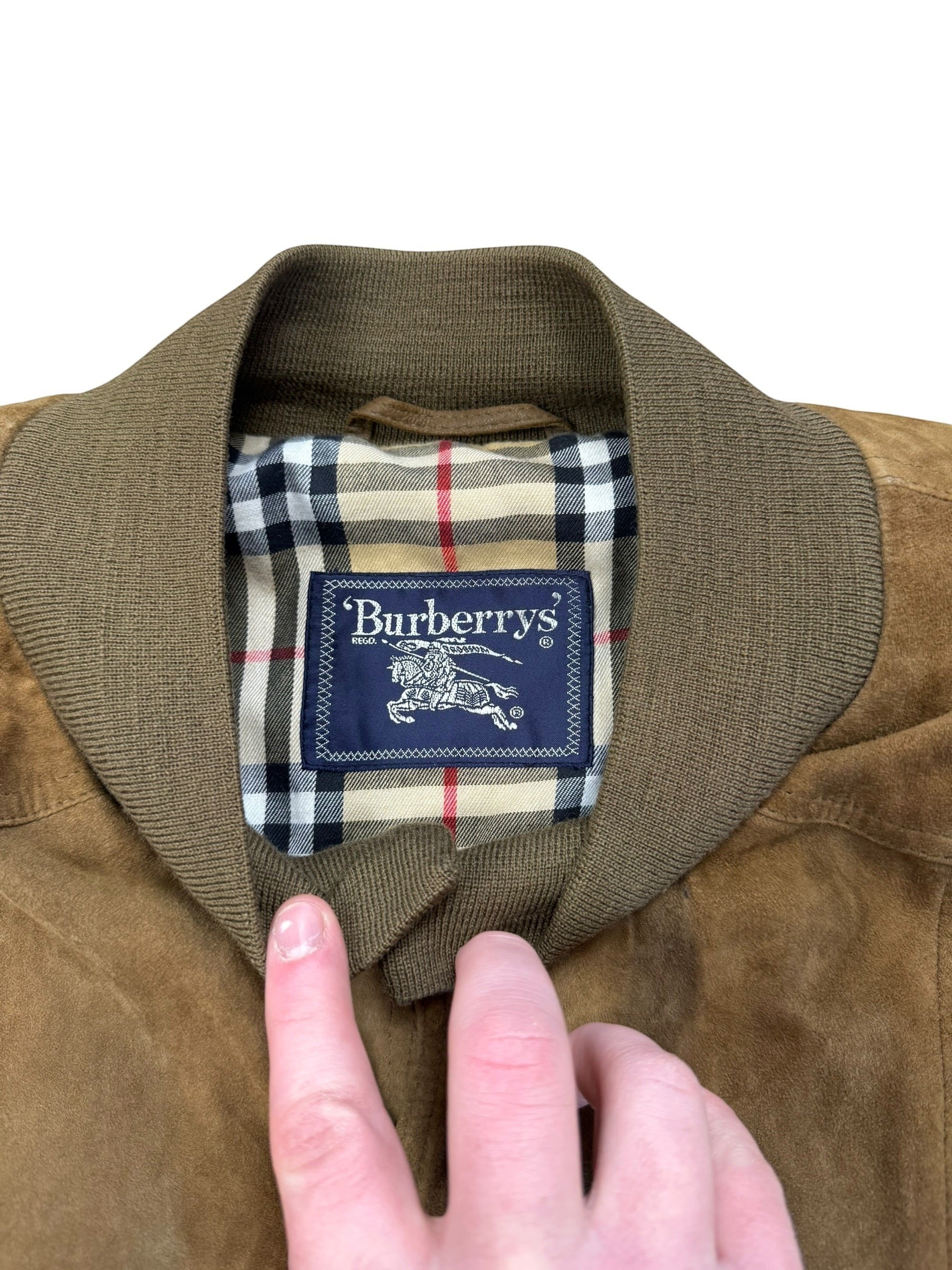 Archive No.9 Burberry khaki suede bomber jacket with iconic check lining and ribbed collar. Size M.