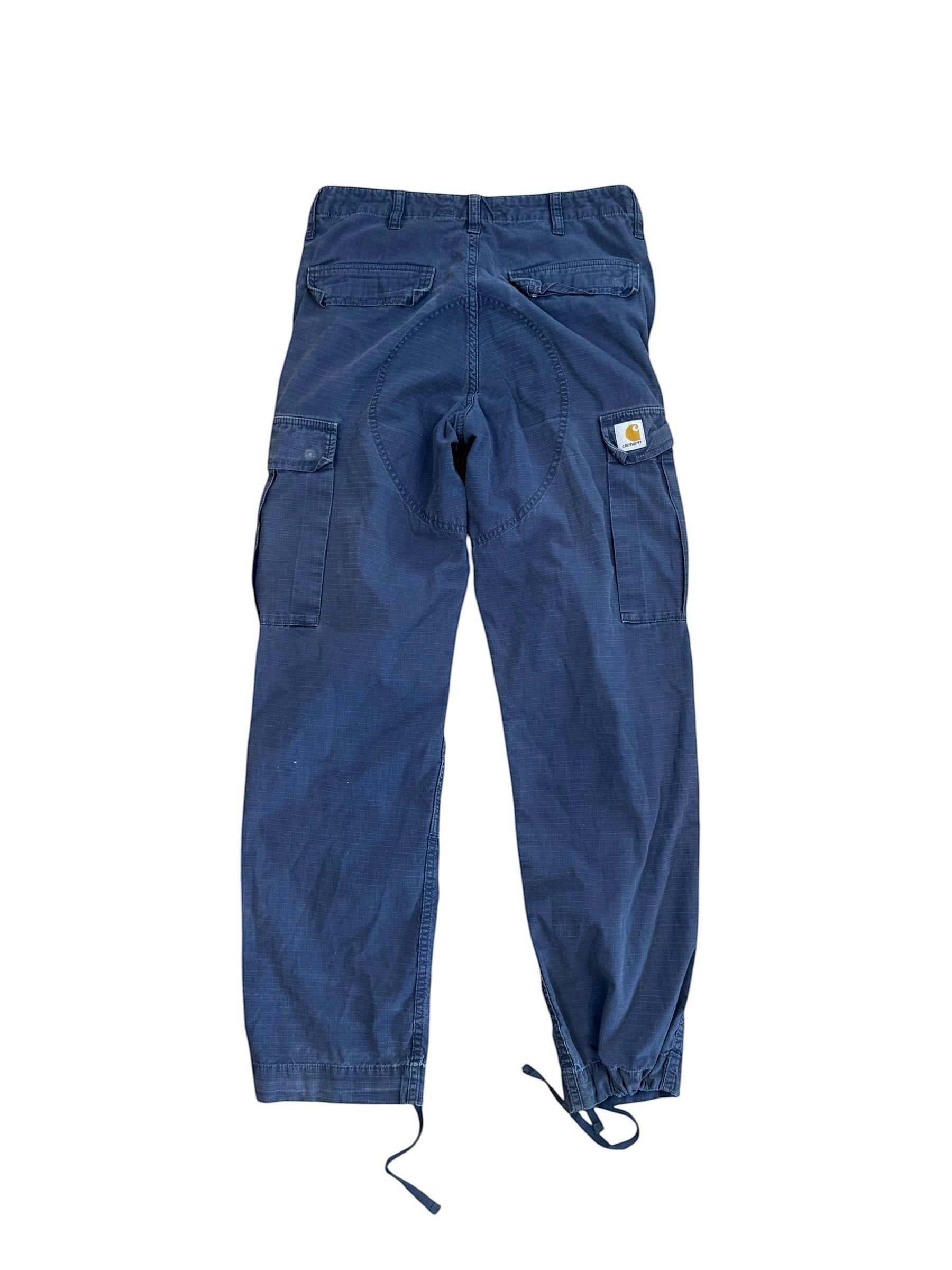 Archive No. 9 blue Carhartt Aviation cargo pants with multiple pockets and drawstring ankles. Durable cotton blend.