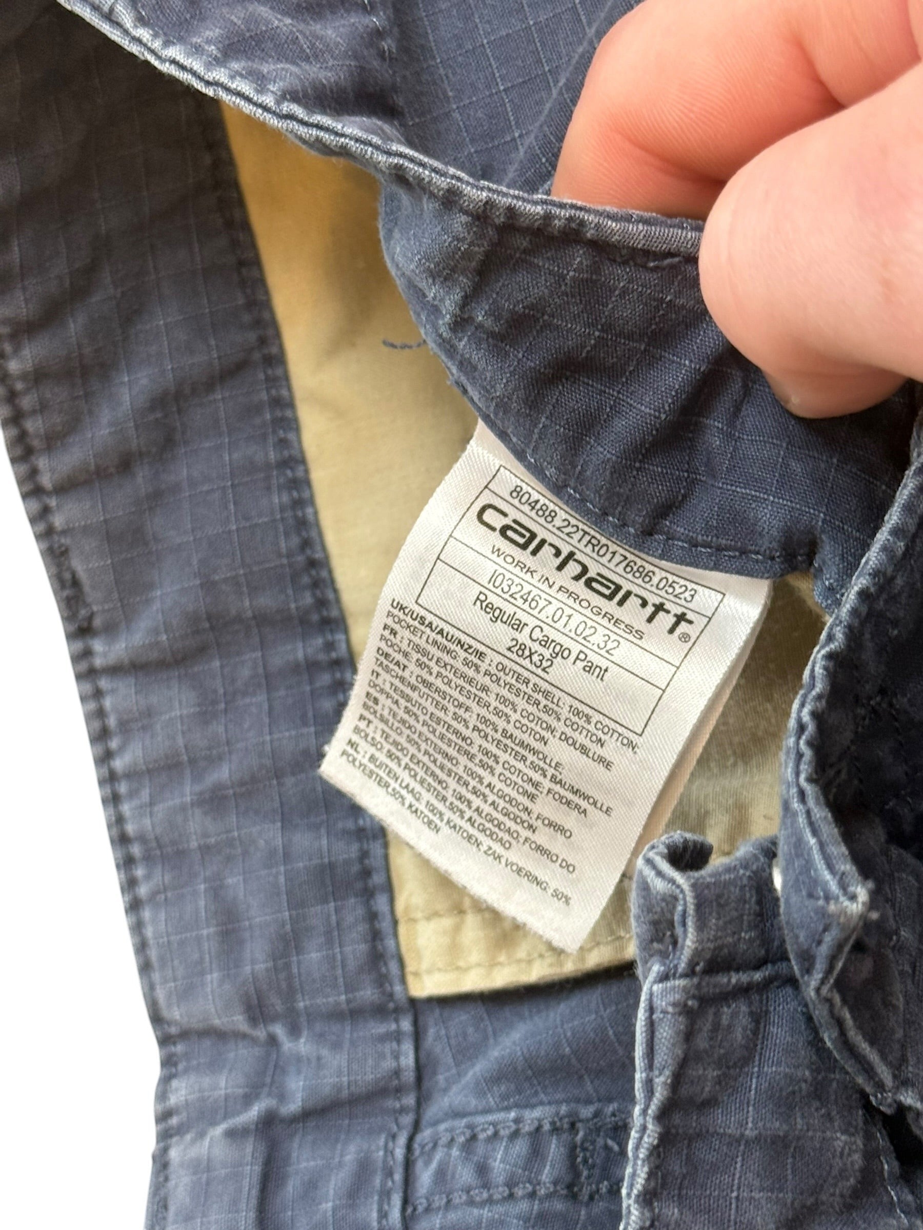 Archive No. 9 grey Carhartt Aviation cargo pants with multiple pockets and a straight fit. Made from durable, lightweight material.