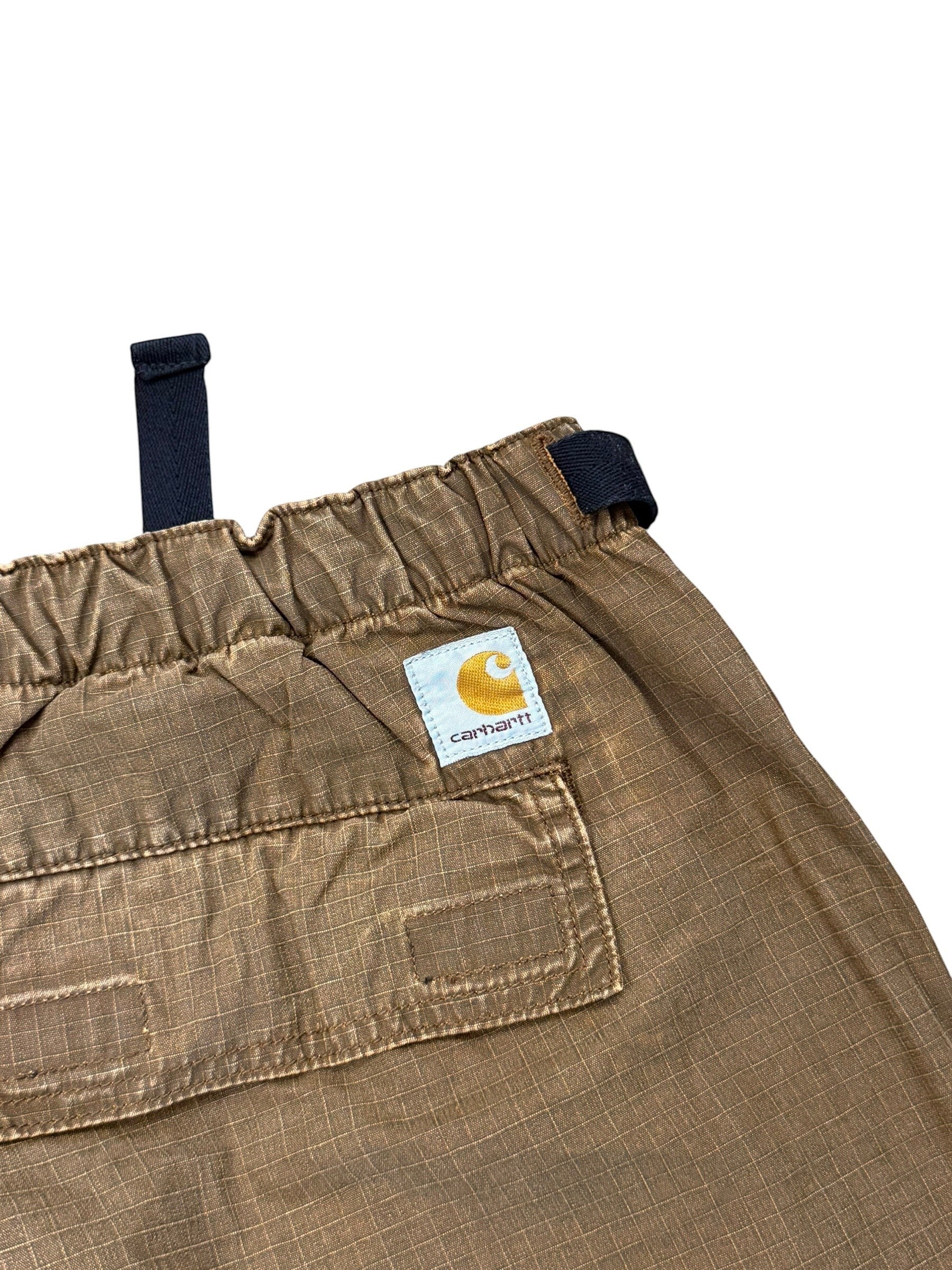 Archive No. 9 Carhartt brown technical fabric shorts with adjustable buckle and utility pockets. Size XL.