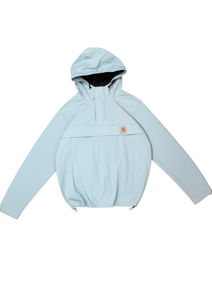 Archive No. 9 turquoise Carhartt smock rain jacket with mesh lining and chest badge. Waterproof, wind-resistant.