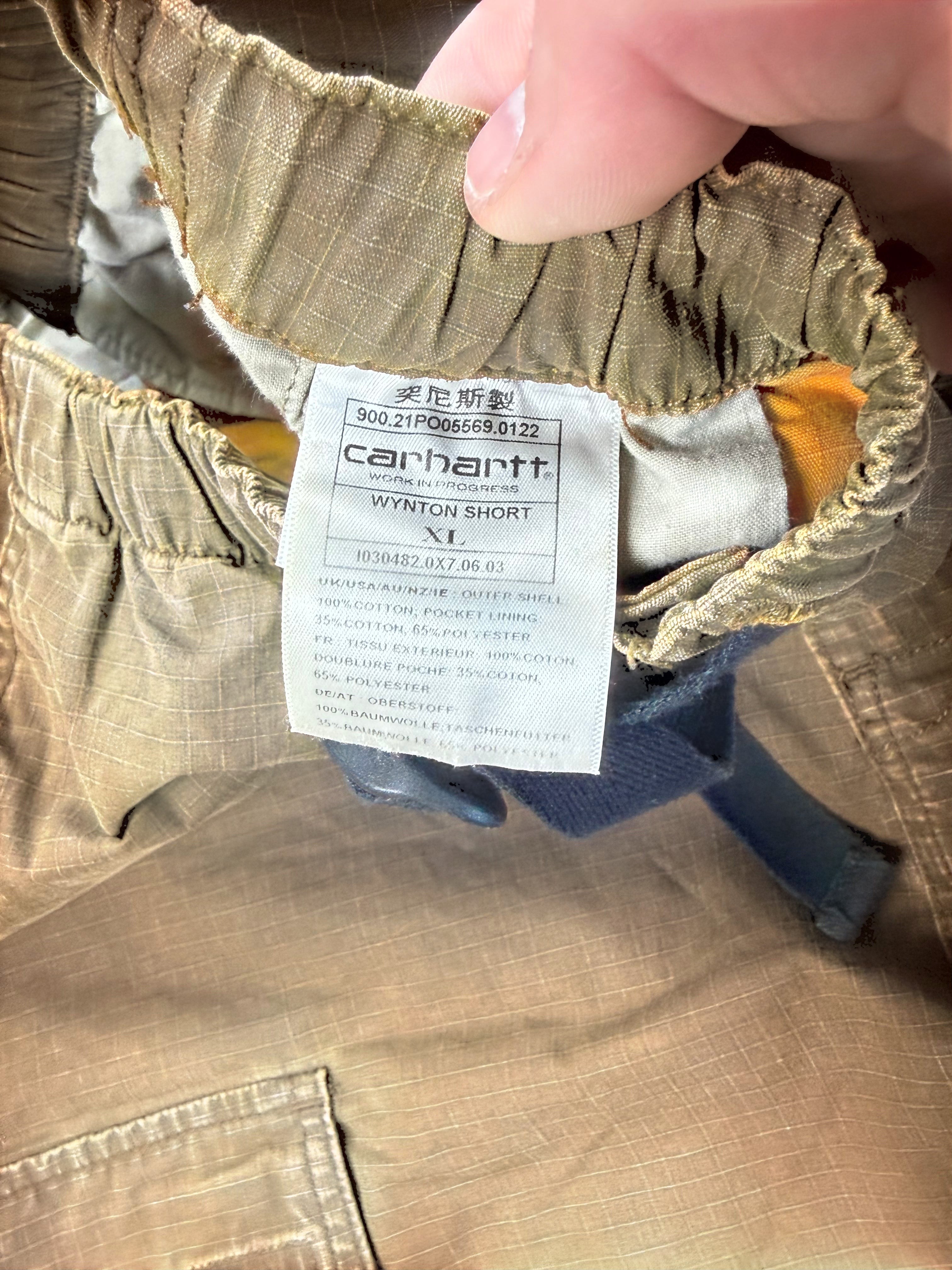 Archive No.9 brown Carhartt Wyton shorts in XL, made from lightweight technical material with an adjustable belt buckle.