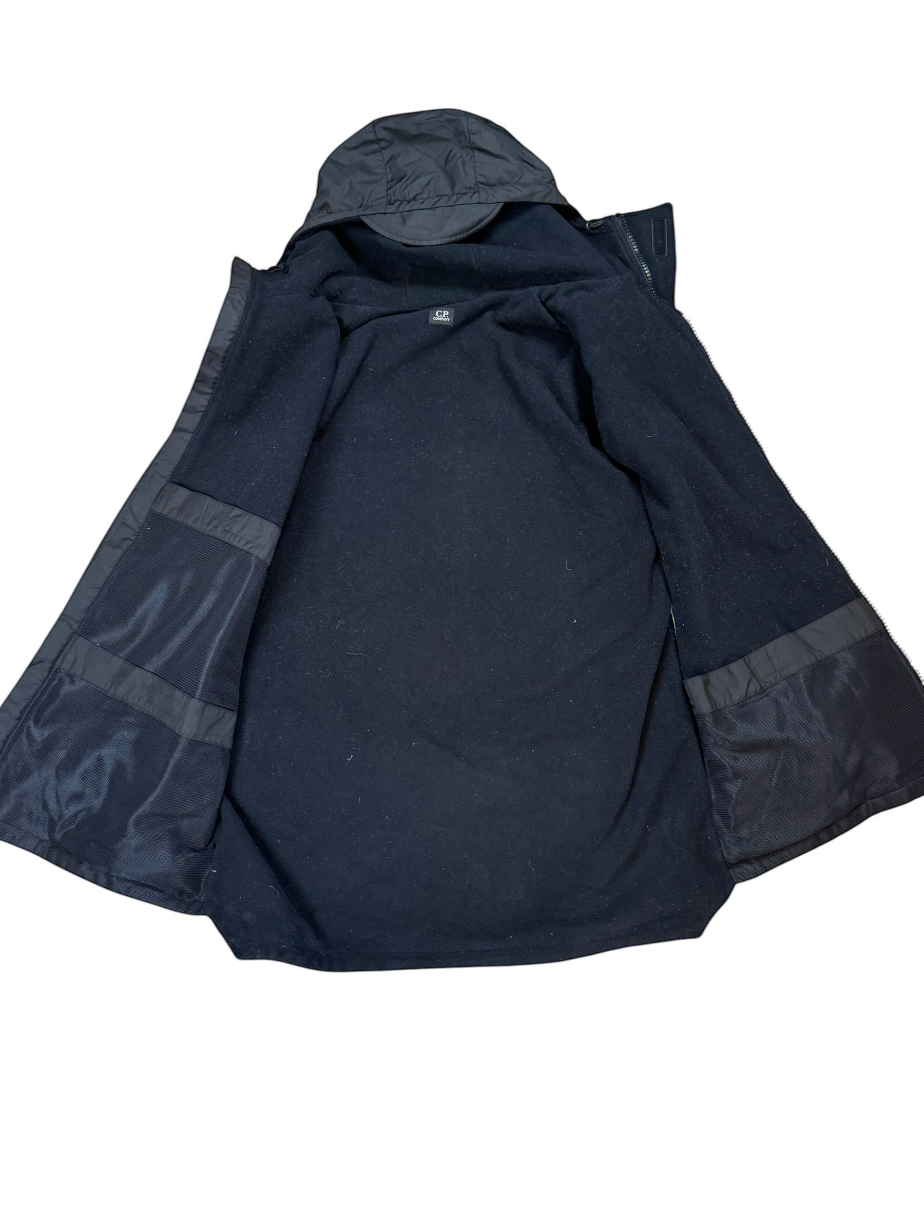 Archive No. 9 black C.P. Company technical 2002 parka jacket with fleece lining and hood, size L.