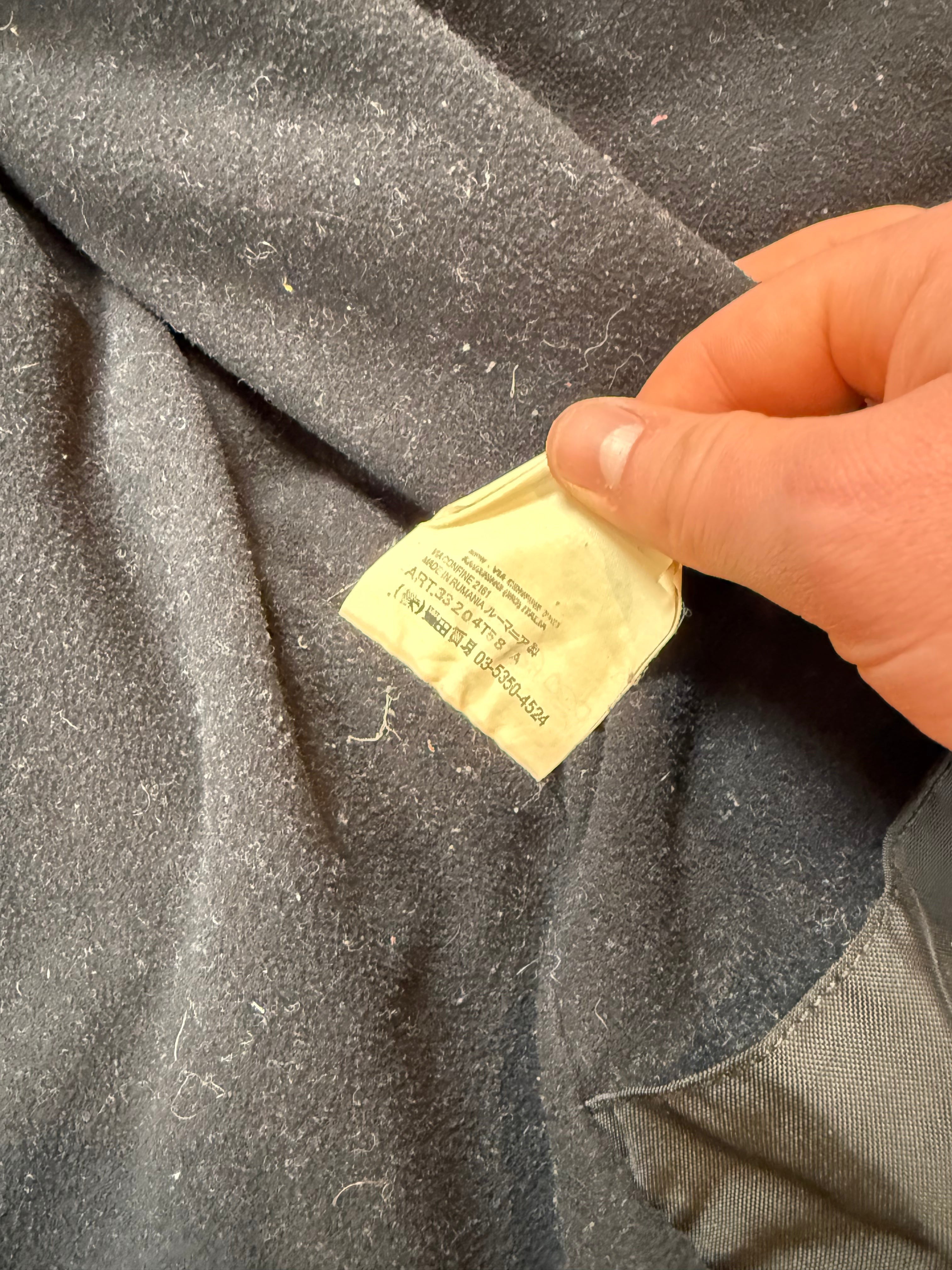 Archive No. 9 black C.P. Company technical 2002 parka jacket, size L, showing interior label.