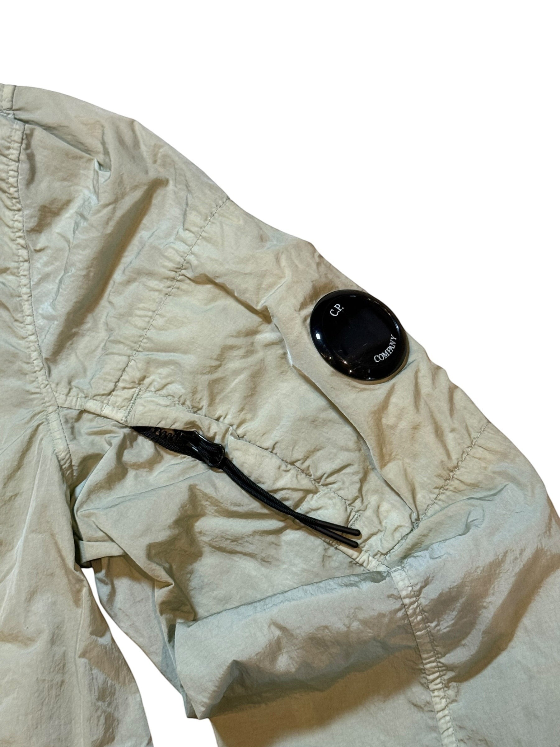 Archive No. 9 C.P. Company beige/cream Chrome-R bomber jacket with lens detail on sleeve, size Medium.