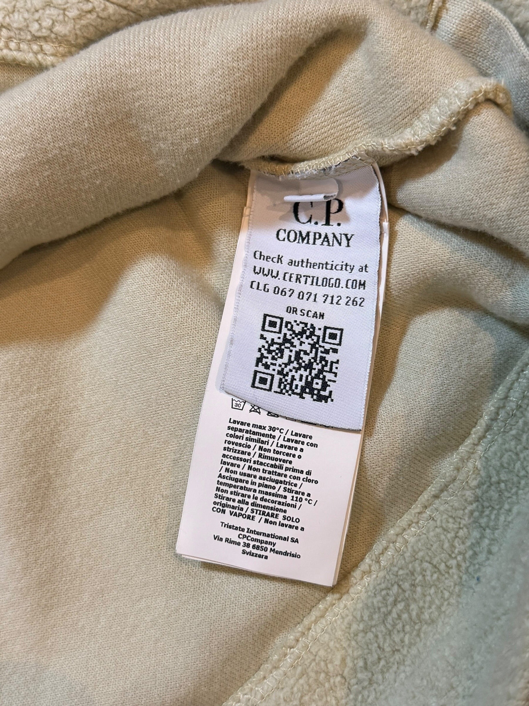 Archive No. 9 C.P. Company beige fleeced cotton jumper with iconic arm lens detail.