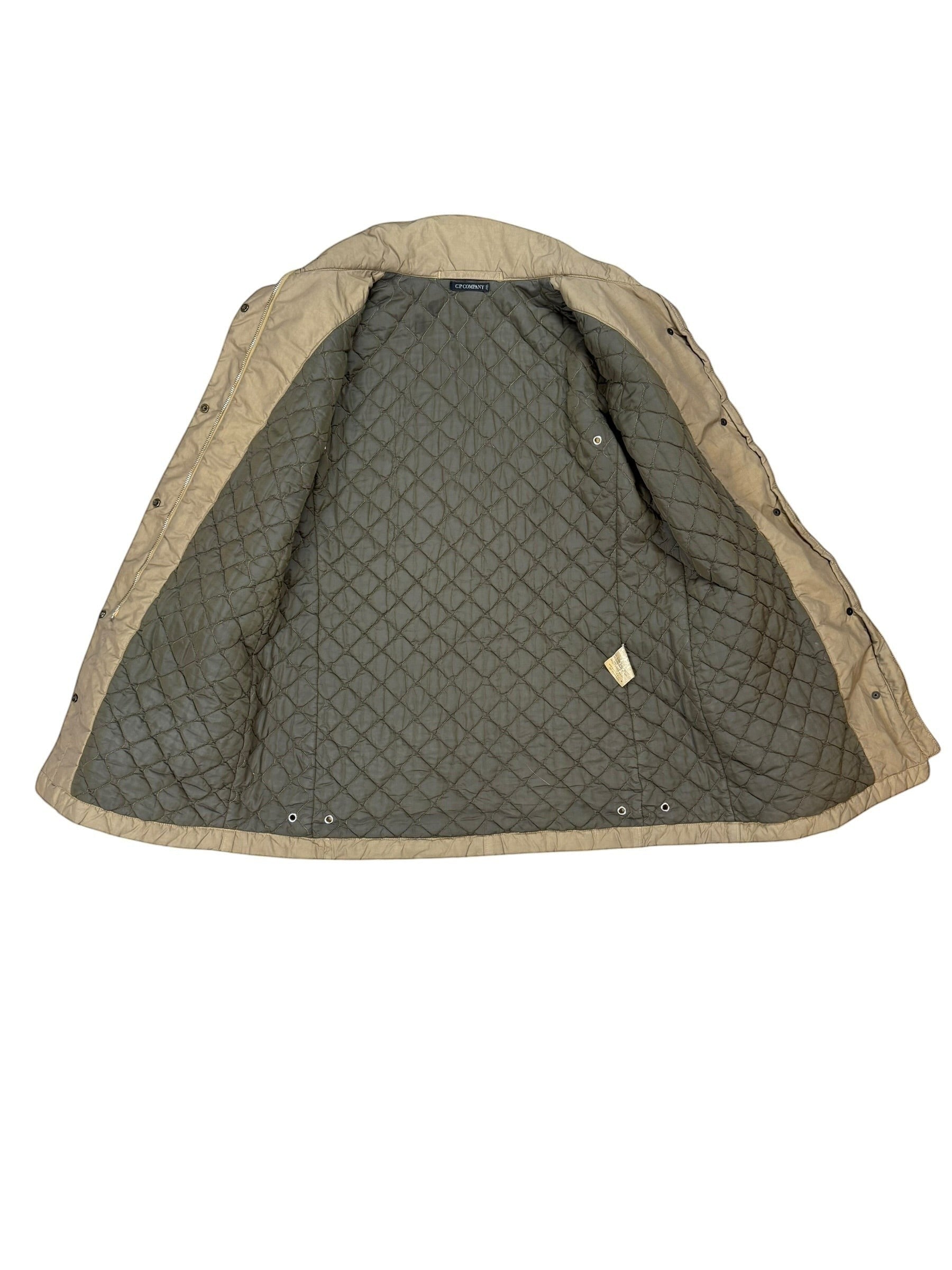 Archive No. 9 beige C.P. Company quilted jacket, size XS. Windproof and waterproof with a regular fit.