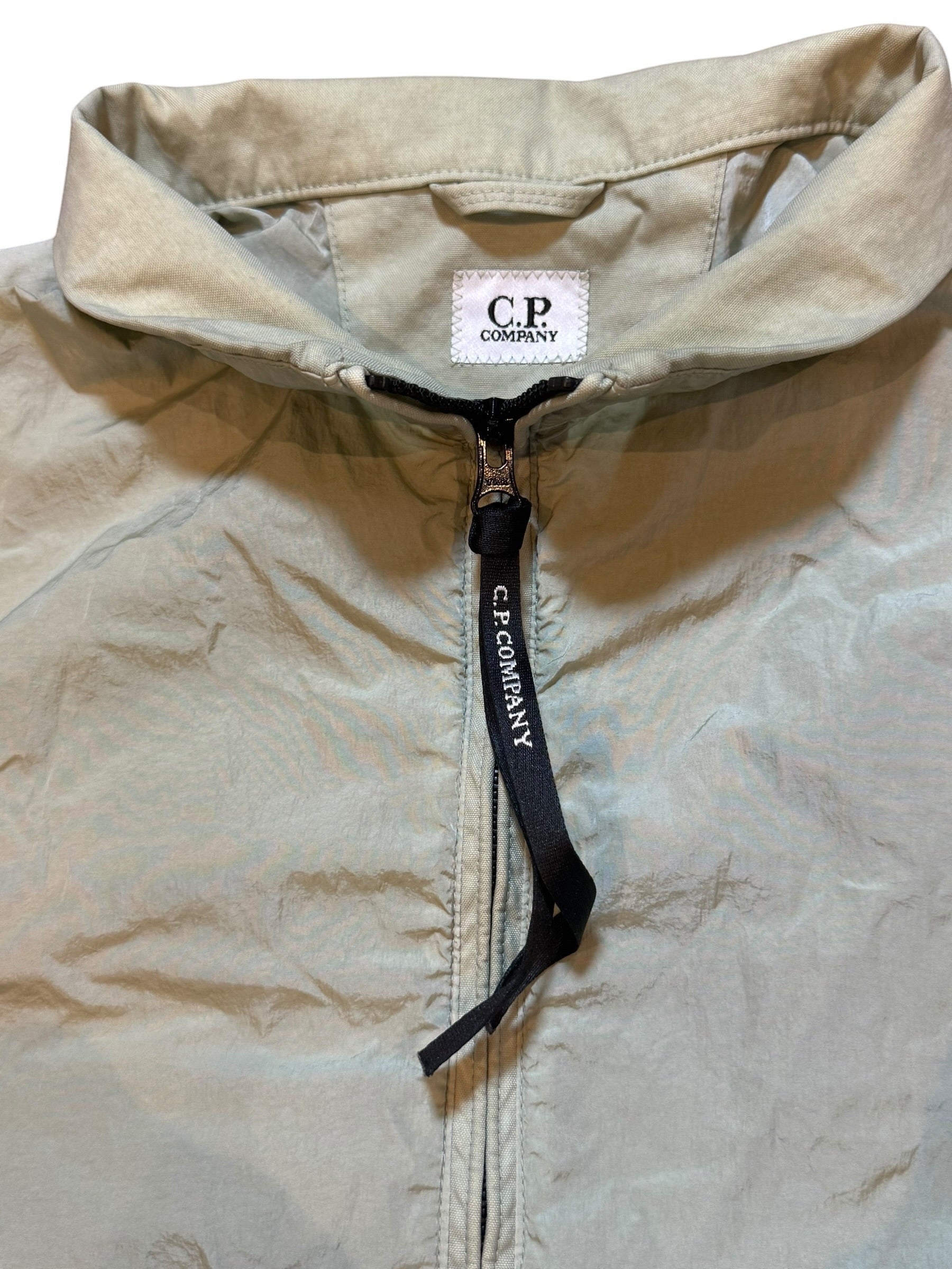 Archive No. 9 C.P. Company beige/cream bomber jacket, size Medium, made with Chrome-R technology for wind and water resistance.