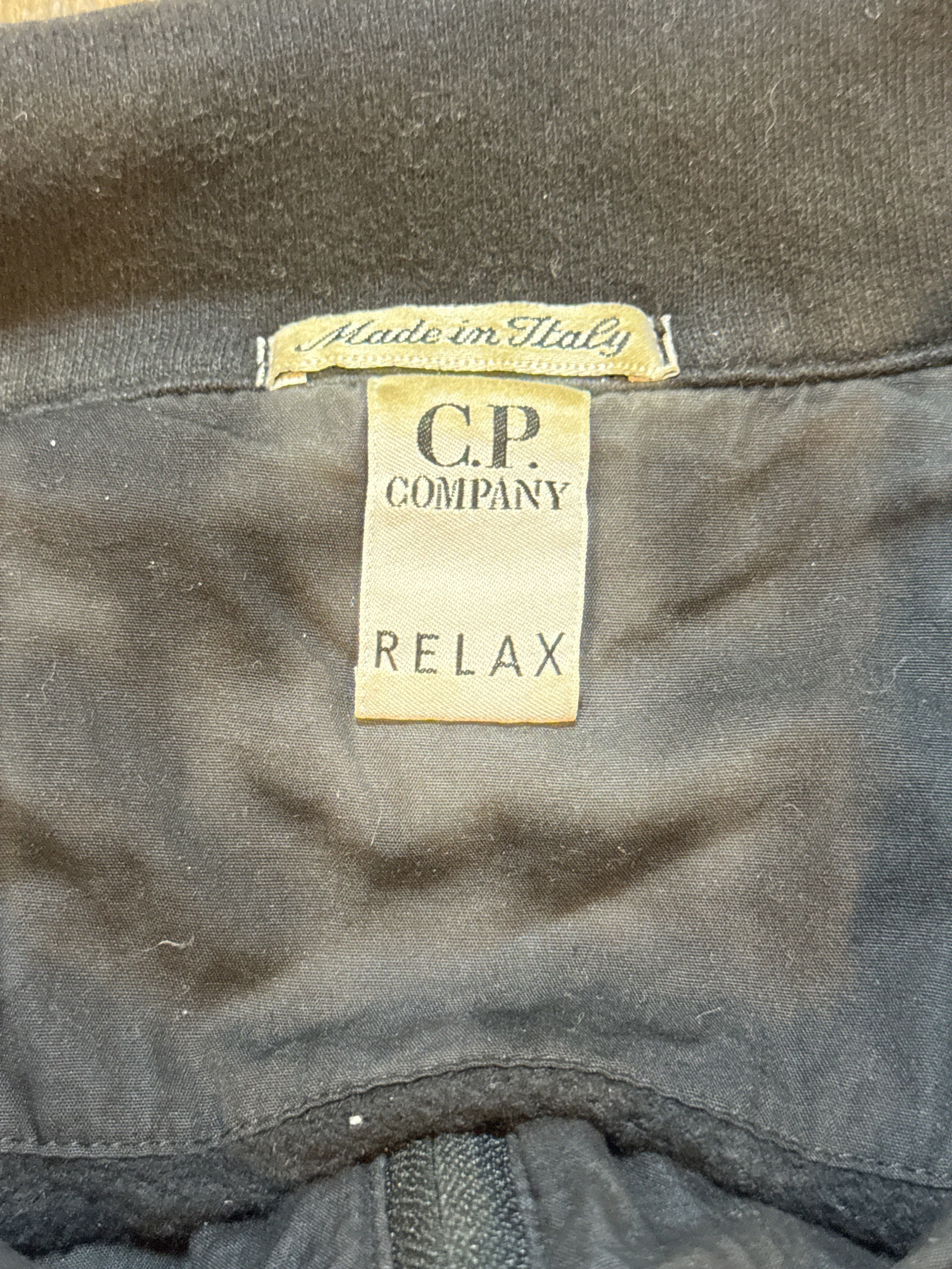 Archive No. 9 vintage black C.P. Company Quarter Zip jumper, size Large, made in Italy with adjustable drawstrings.
