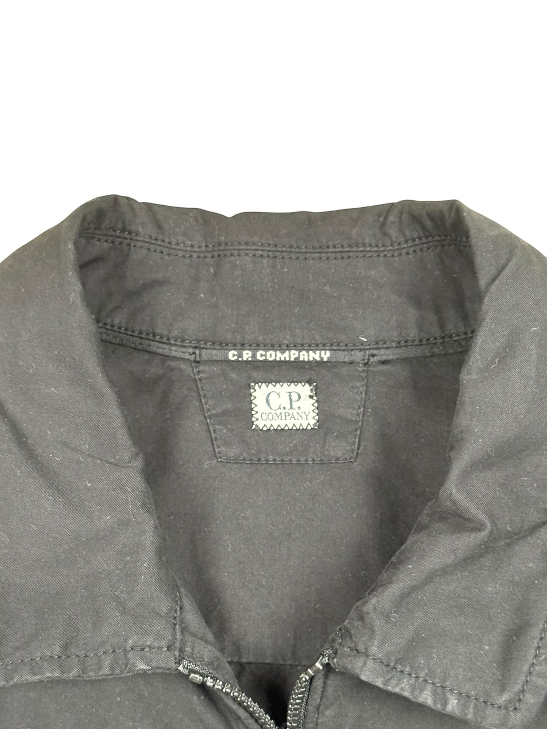 Archive No. 9 C.P. Company black cotton overshirt with iconic lens detail on arm. Size S.