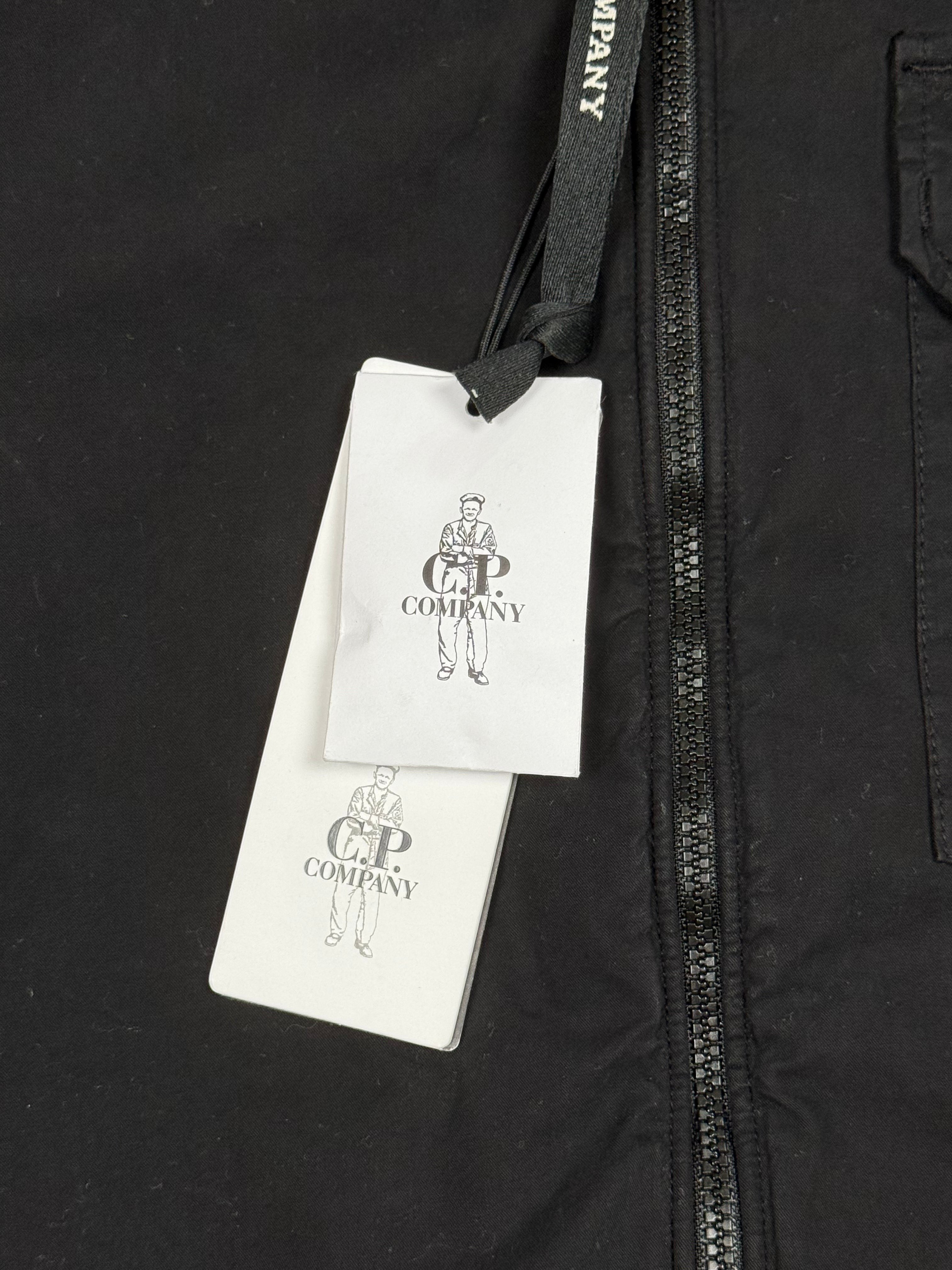 Archive No. 9 C.P. Company black 100% cotton overshirt with iconic lens detail on the arm. Size S.