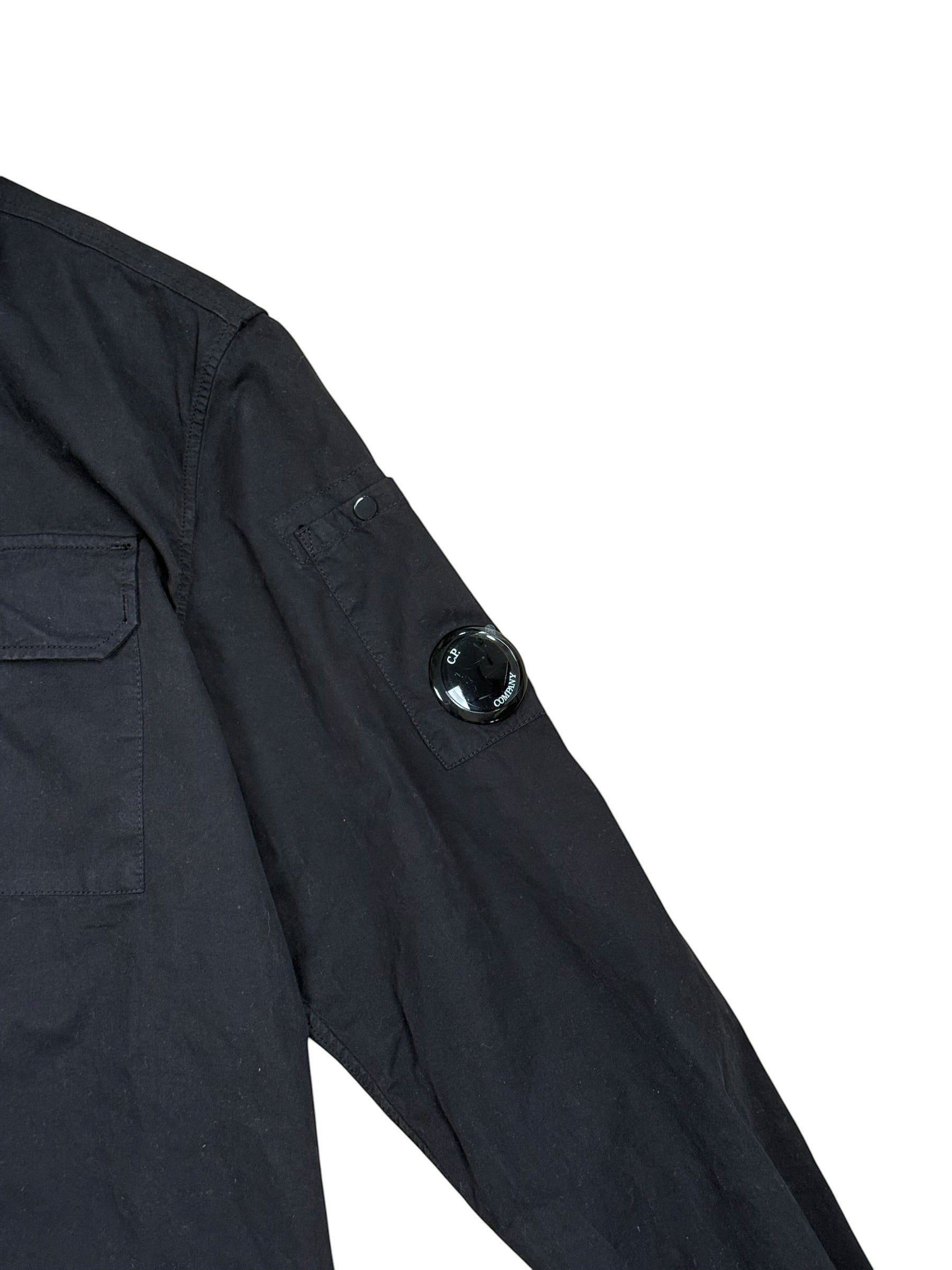 Archive No. 9 C.P. Company black cotton overshirt with iconic lens detail on sleeve and chest pocket.