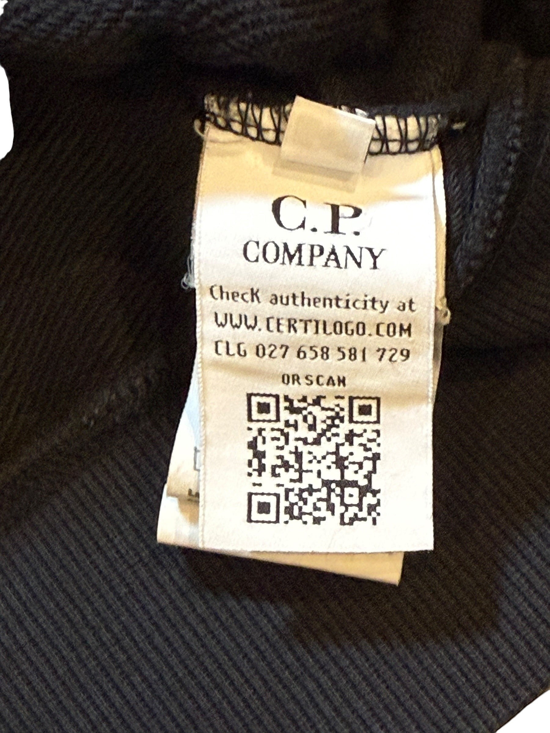 Archive No. 9 black C.P. Company hoodie with lens detail on arm and logo on hood. Size Small.