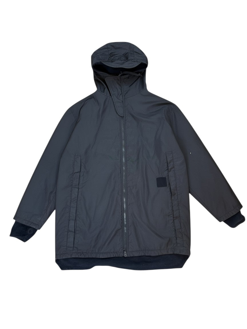 Archive No. 9 black C.P. Company technical 2002 parka jacket with hood, zip closure, and fleece lining. Size L.