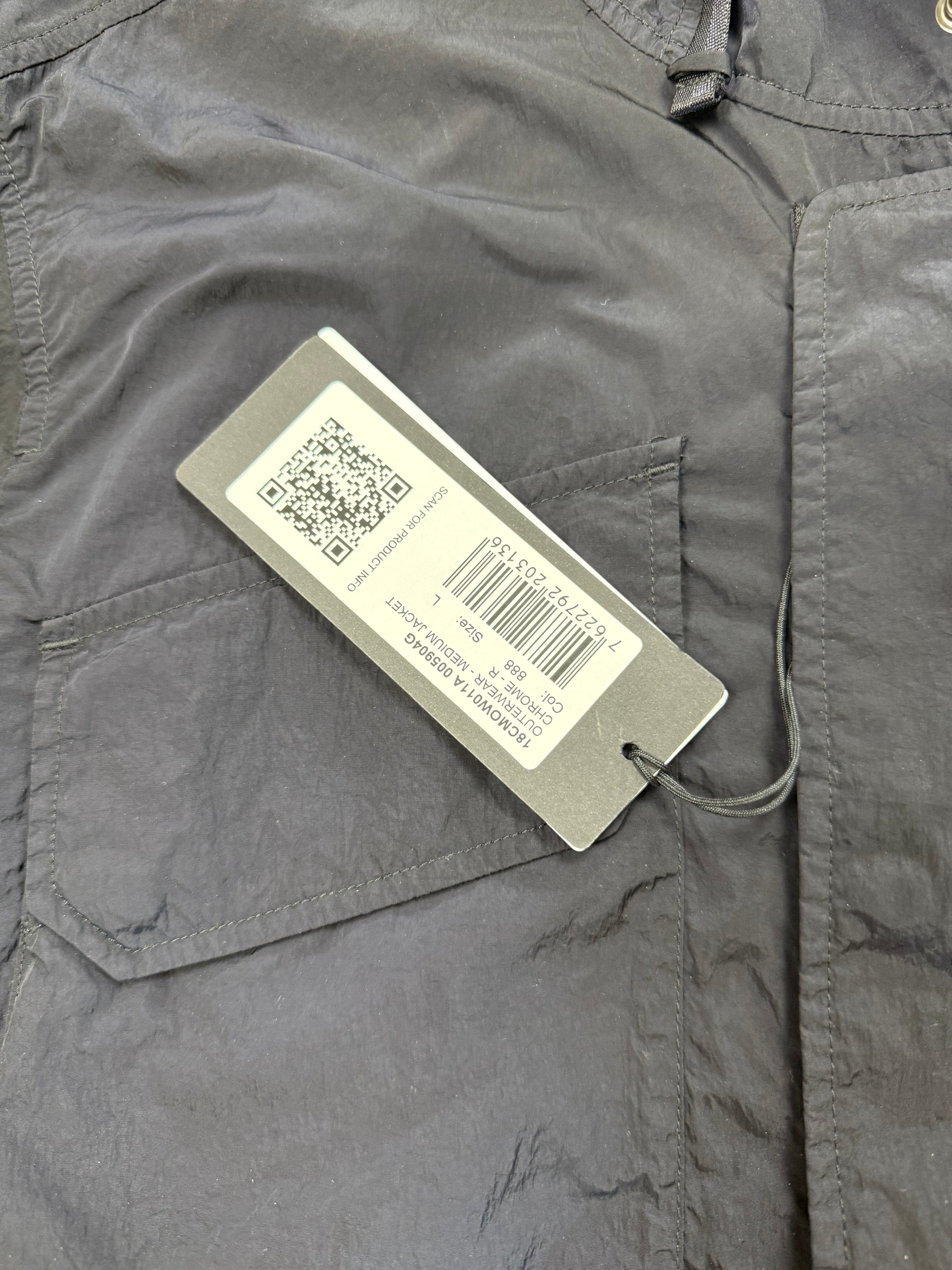 Archive No. 9 black C.P. Company Chrome R utility windbreaker jacket with multiple pockets and waterproof features.