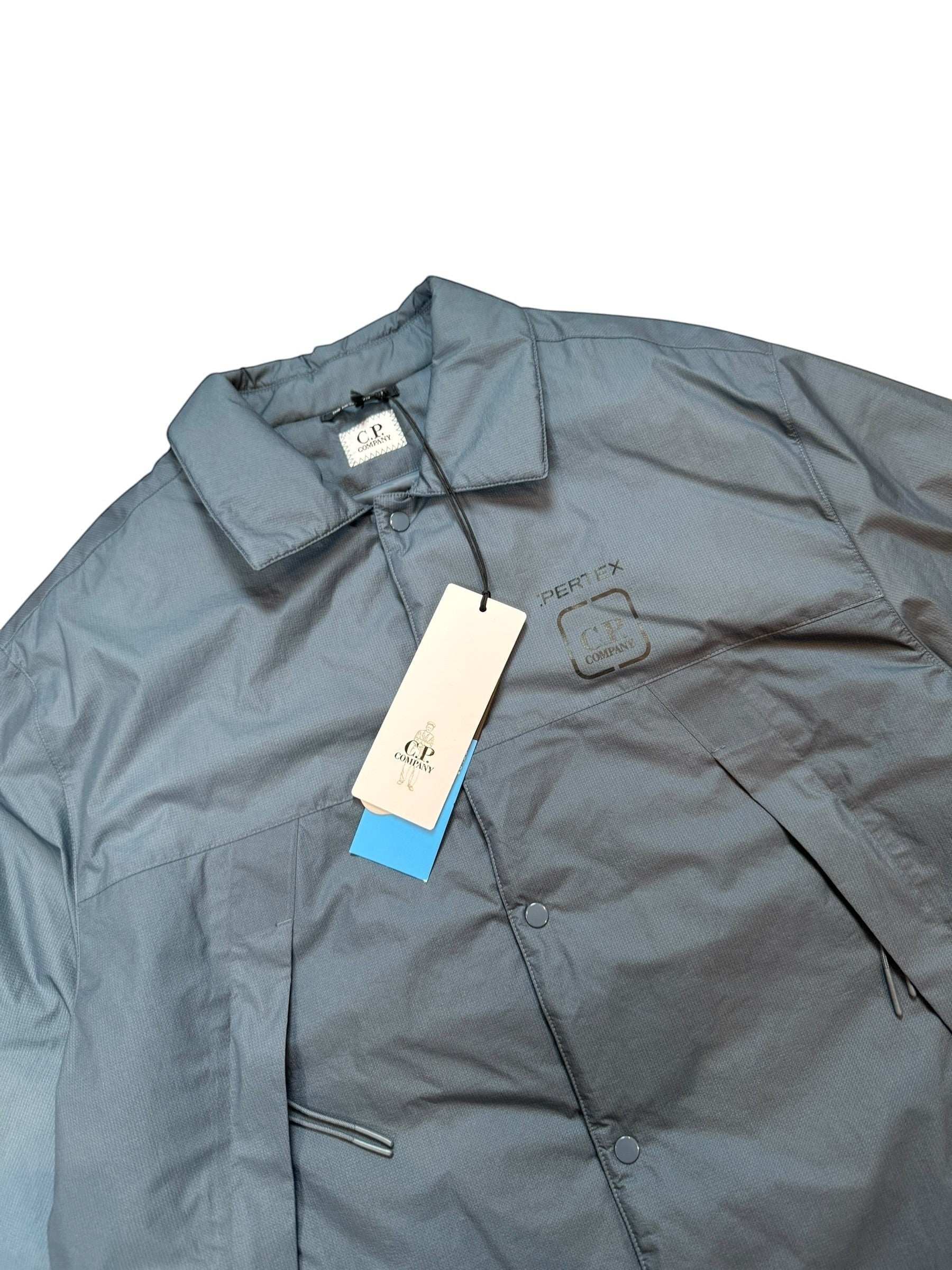 Archive No. 9 blue C.P. Company Metropolis Series bomber jacket with PERTEX technology, size M.