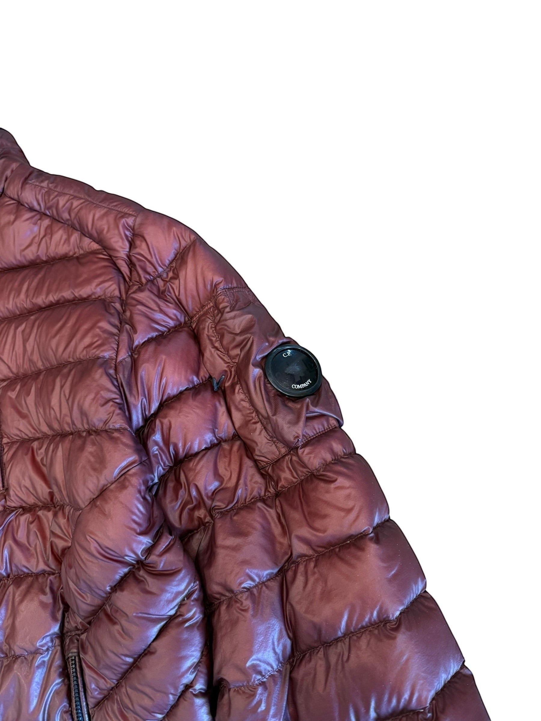 Archive No. 9 C.P. Company burgundy DD Shell puffer jacket, size Large, with signature lens detail on sleeve.
